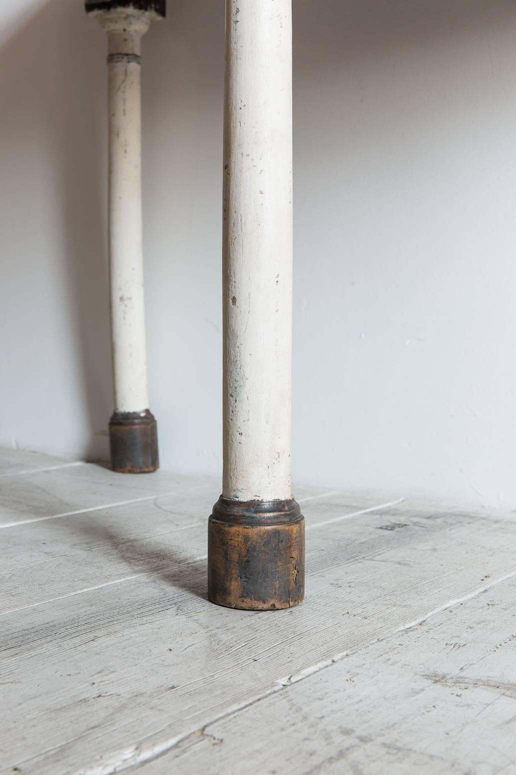 Rustic Wooden Demilune Table with White Painted Base and Cylindrical Feet In Distressed Condition In Los Angeles, CA
