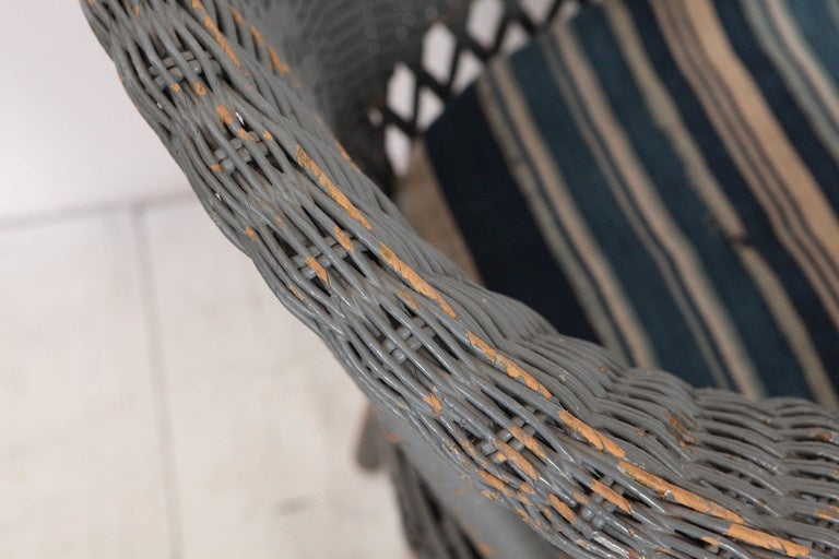 Vintage Wicker Veranda Chair with African Mudcloth Cushion In Distressed Condition In Los Angeles, CA