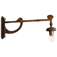 Antique Brass Swing Arm Sconce