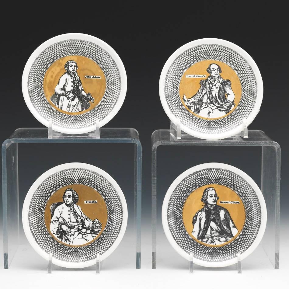 Piero Fornasetti coaster set,
Americana, 
1960s.

The set of eight coasters, lithographed, gilded and glazed, depicts Washington, John Adams, General Lincoln, Franklin, General Wayne, Paul Jones, General Clinton and Jefferson. 

Marked