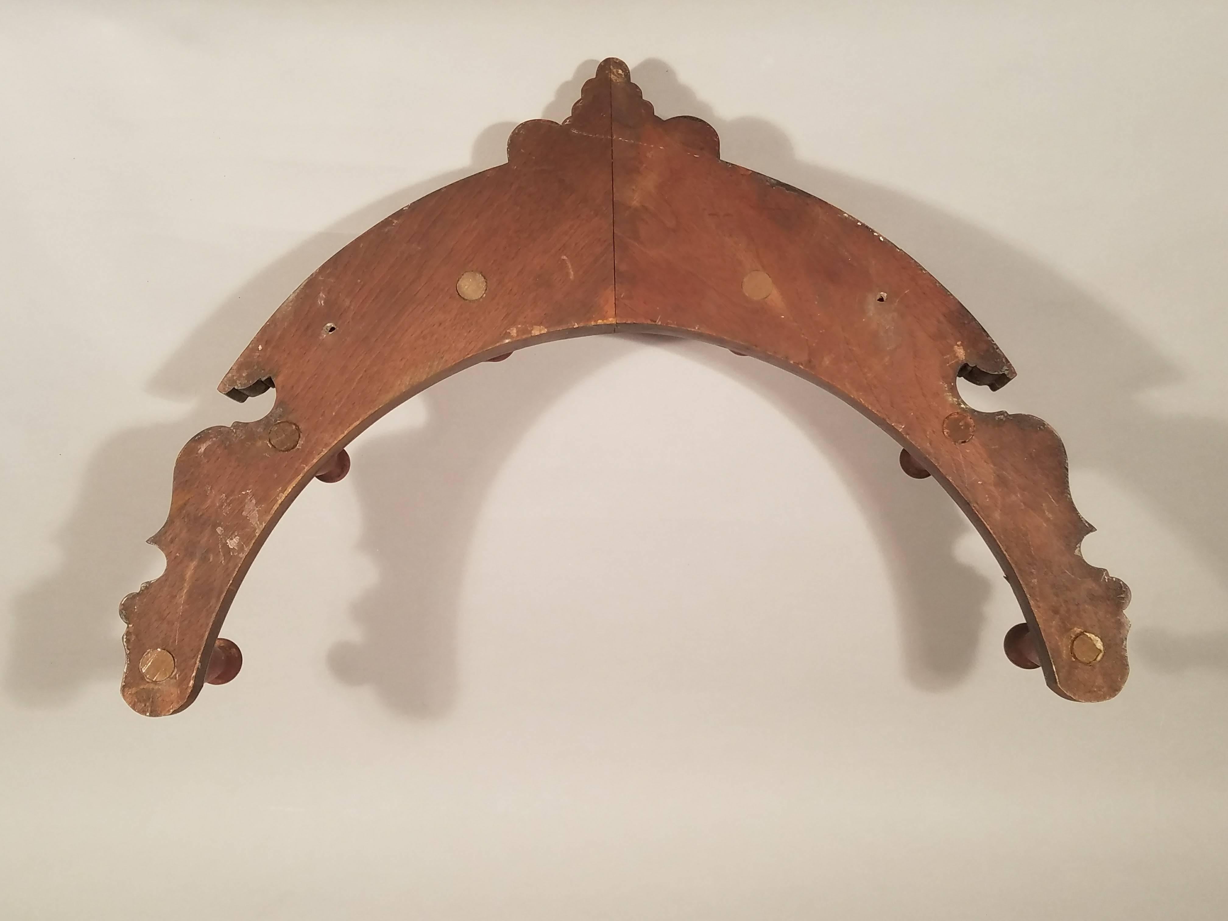 Victorian wood horse tack rack, late 19th century.

The horseshoe-shaped tack rack is centered with an unknown armorial coat of arms and is made using two different colored woods.

Dimensions: 18 inches high x 24 1/4 inches wide x 5 deep.