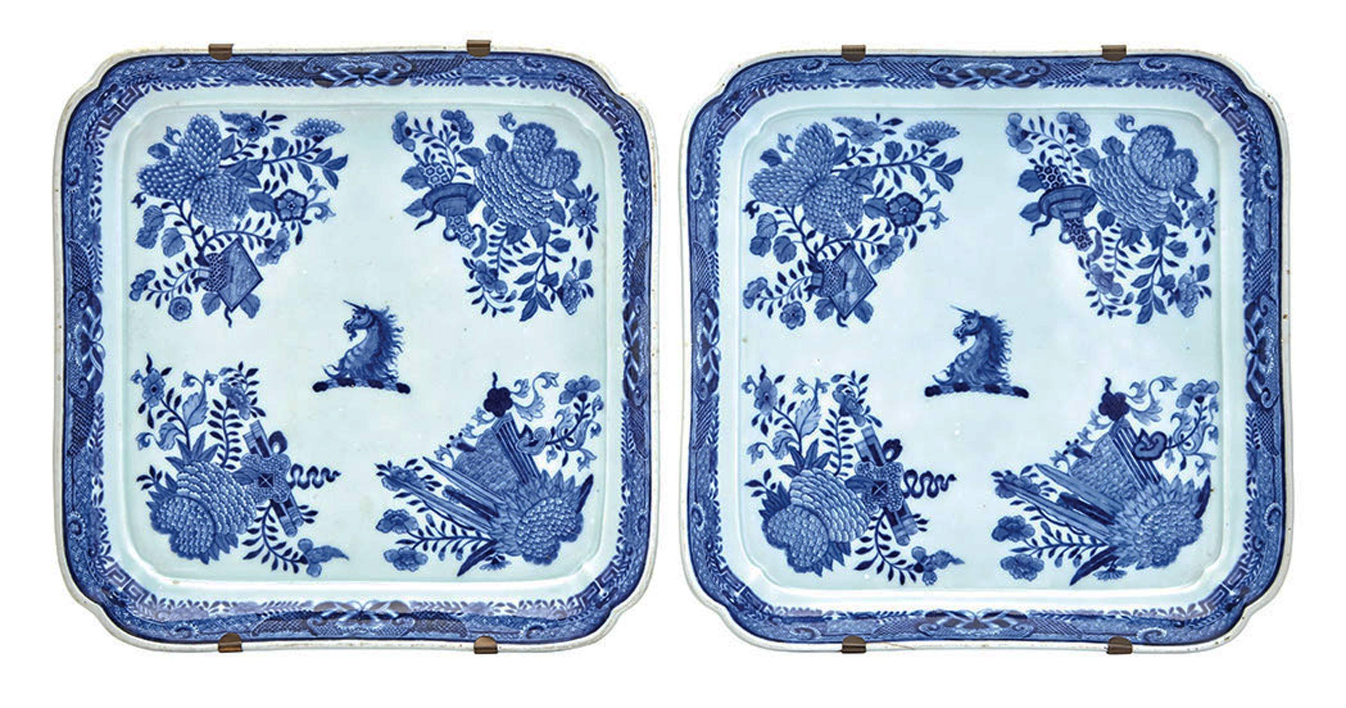 Knock your socks off dramatic!

Chinese export crested blue fitzhugh footed trays, 
Beale family, 
circa 1800.

Each of square form with lobed corners raised on four low bracket feet. 

The Beale family were involved in The East India