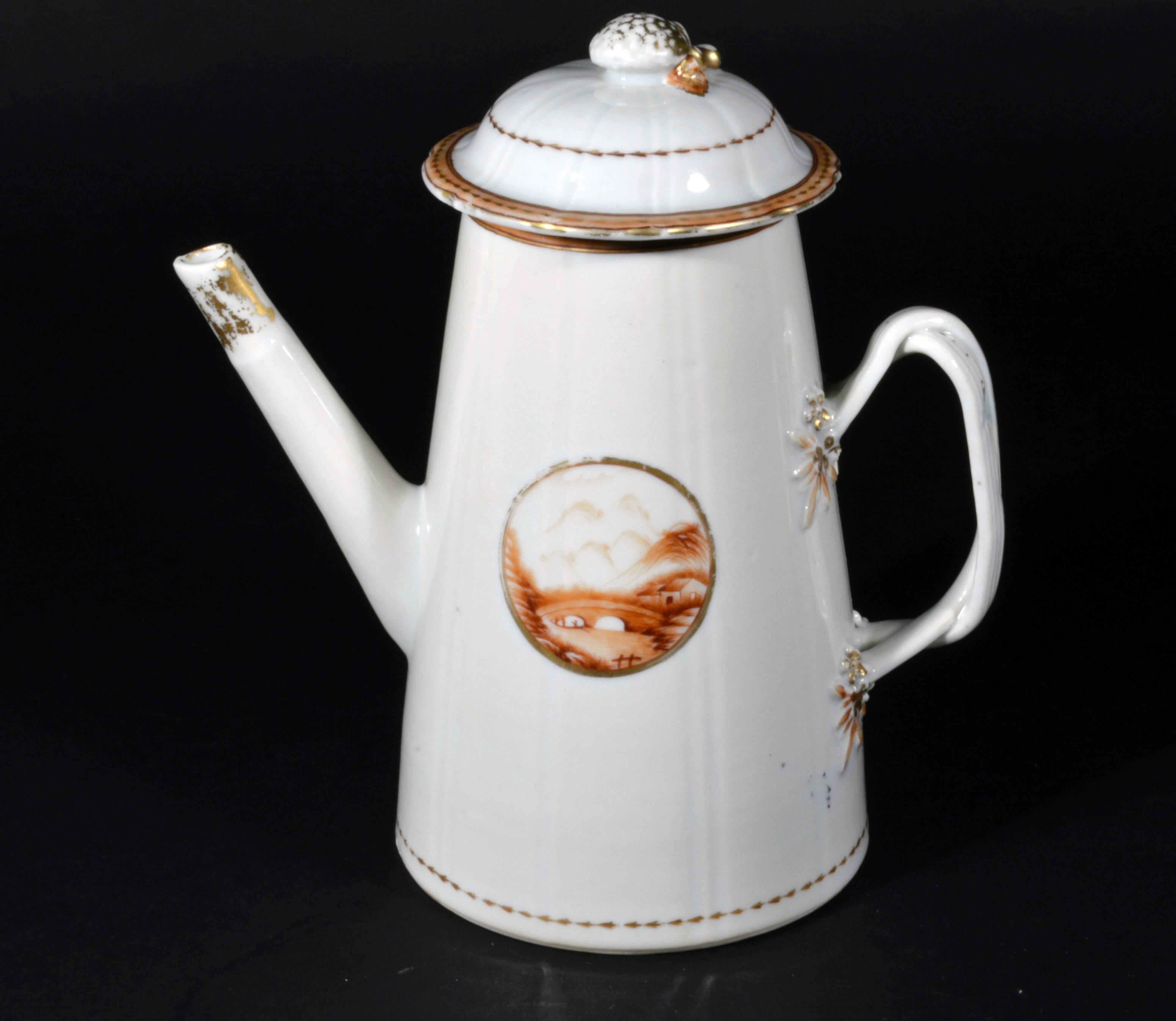The Chinese Export lighthouse coffee pot is painted with a sepia roundel containing a scene of a bridge over a river to each side. The double strap-handle with orange terminals.  The rim of the cover and top of the pot with an orange band with gilt