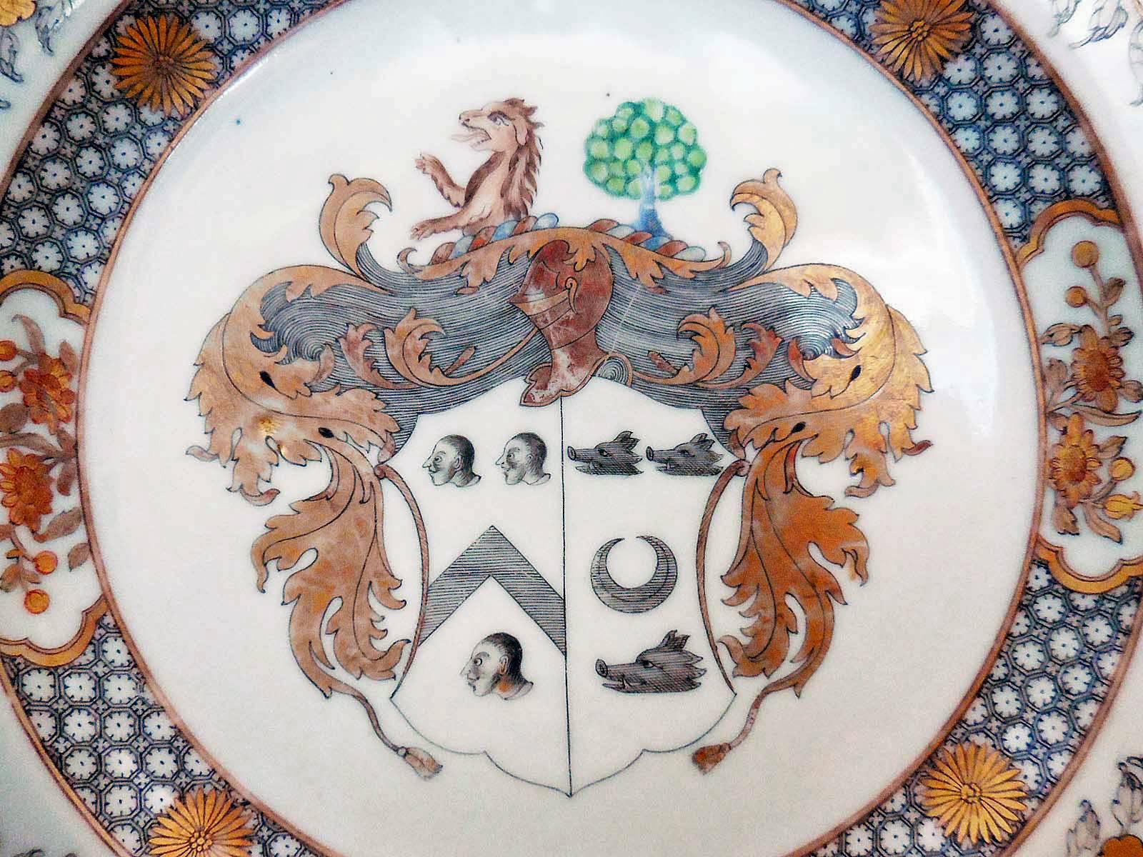 The Chinese Export porcelain armorial plates are from the Yung Cheng period, circa 1735.

The coat of arms of of Moore impaling Hog being painted en grisaille, 