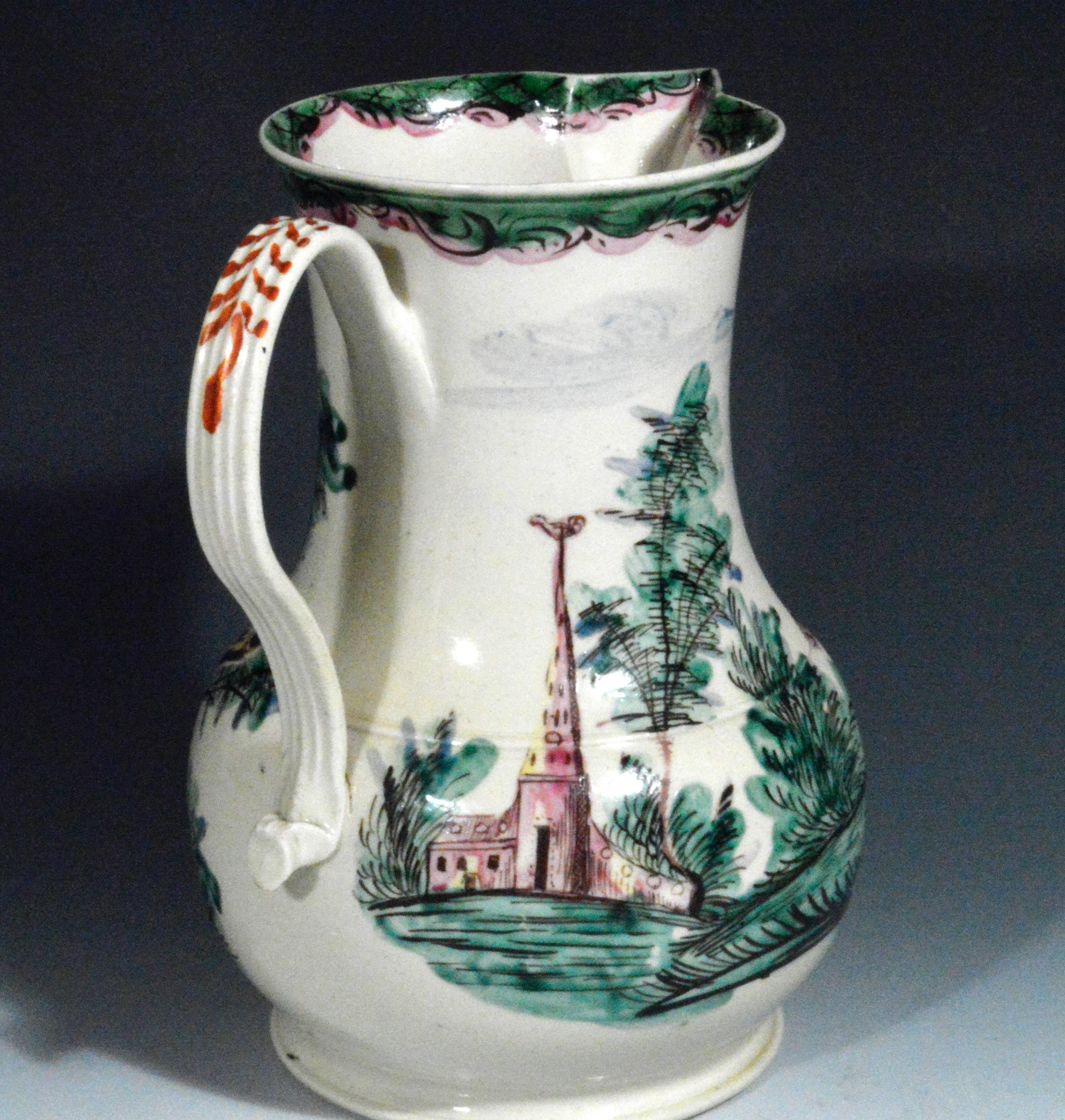 Salt glazed cider jug with polychrome decoration,
circa 1765

The jug is painted in colorful enamels with a courting couple in a tree-filled landscape, a church to one side with a weathercock on its tall spire and a smaller building to the other