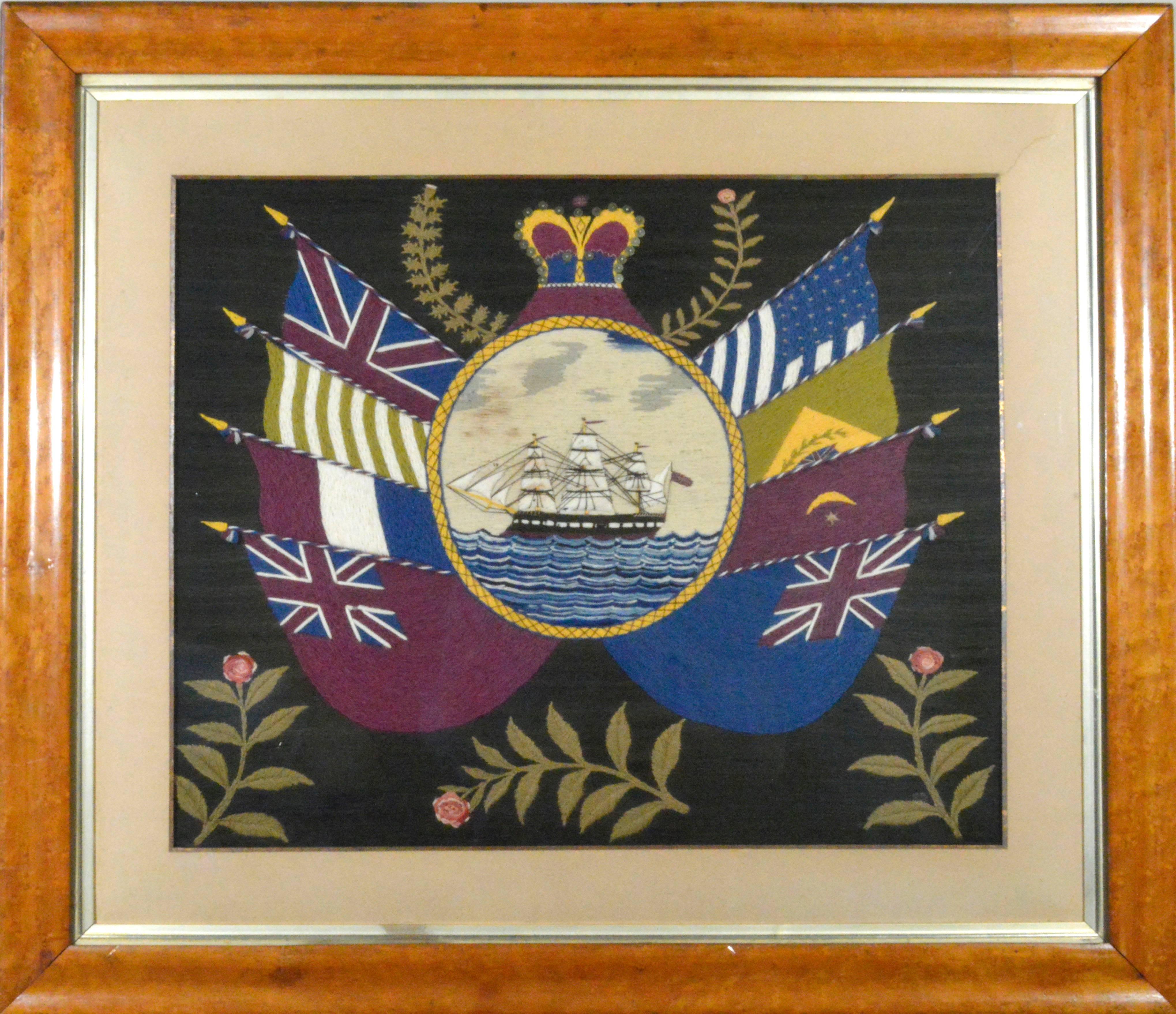 The pair of large Sailor's woolwork pictures are within maple frames and a gilt inner border with a sand colored mat. These are known as woolies.

The pictures are a true pair with all the details reversed with the ships facing towards each other.