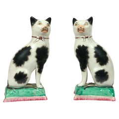 Pair of Staffordshire Pottery Seated Cats on Cushions