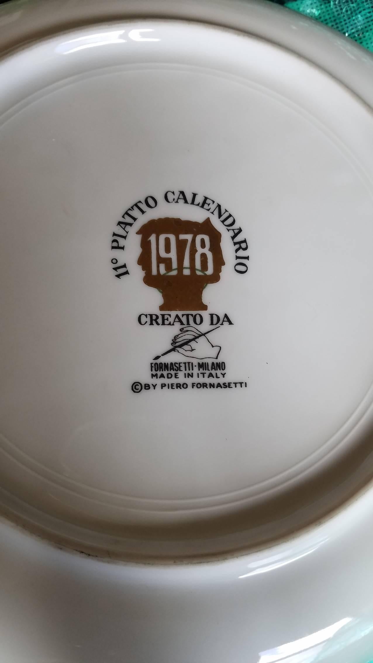 Fornasetti calendar plate, number 11 in series. The plates made during Piero Fornasetti's life time, like this example, were only made to be given to friends and clients.

According to the Fornasetti website, 