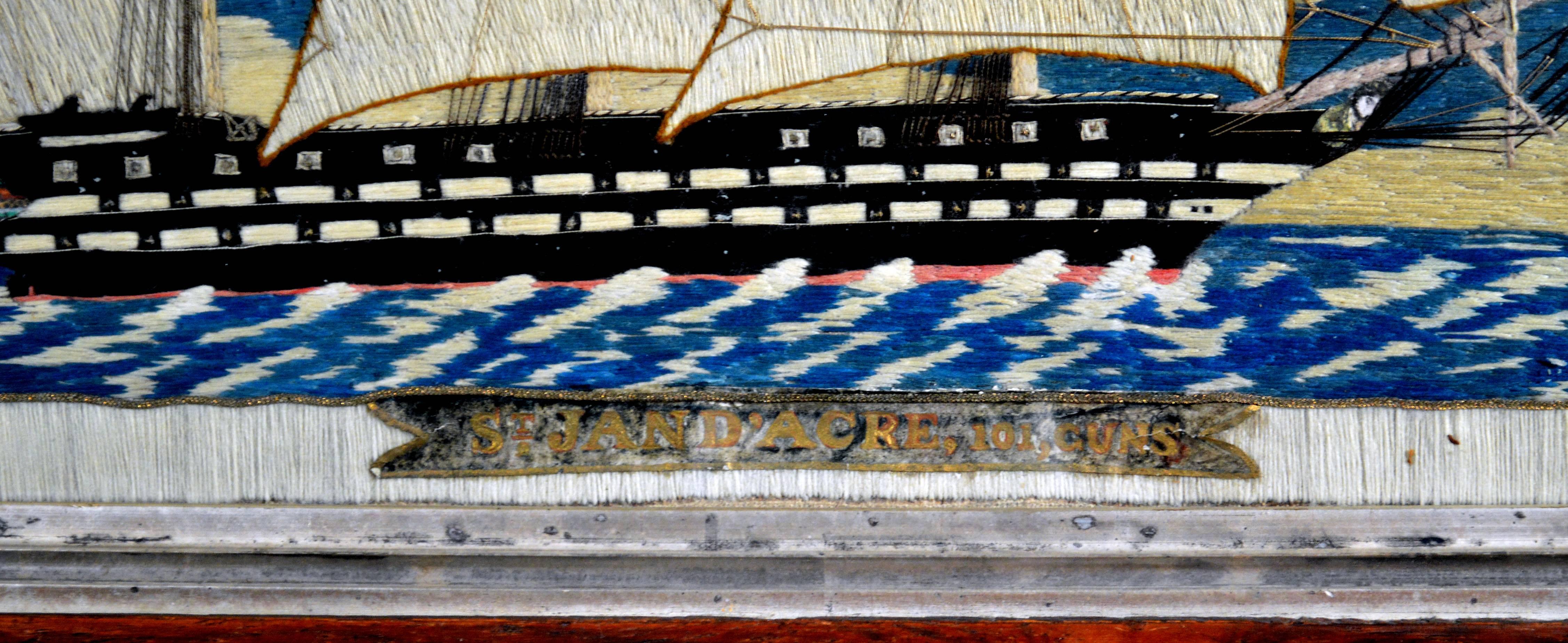 English Sailor's Large Woolie Picture of the Named St. Jean D' Arcre, 
101 Guns, 
circa 1860-1870.

The sailor's woolwork depicts a starboard view of the St. Jean D'Arcre under full sail on a stylized choppy sea with bands of blue sky