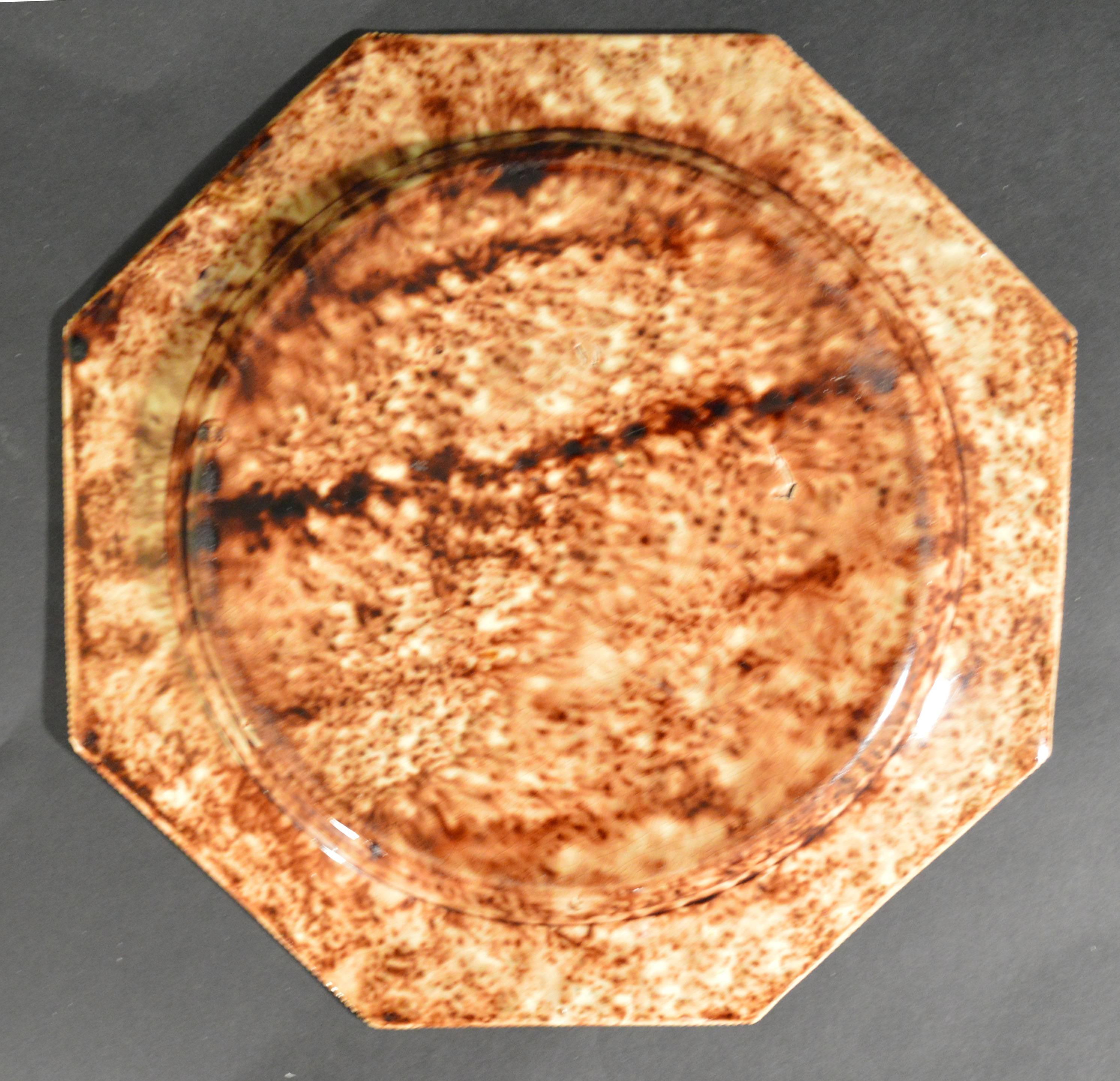 English creamware silver-form whieldon plate, 
circa 1765-1775.

A lovely tortoise-shell coloured creamware plate with a strong raised molded gadroon rim.

Dimensions: 8 3/4 inch diameter.