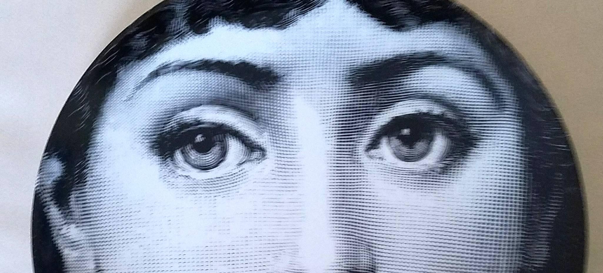 Fornasetti Tema E Variazioni plate,
Number 137,
Based Upon the image of Lina Cavalieri's face.
Atelier Fornasetti

A variation of Fornasetti's Tema E Variazioni series based on the face of the opera singer Lina Cavalieri.

Piero Fornasetti's