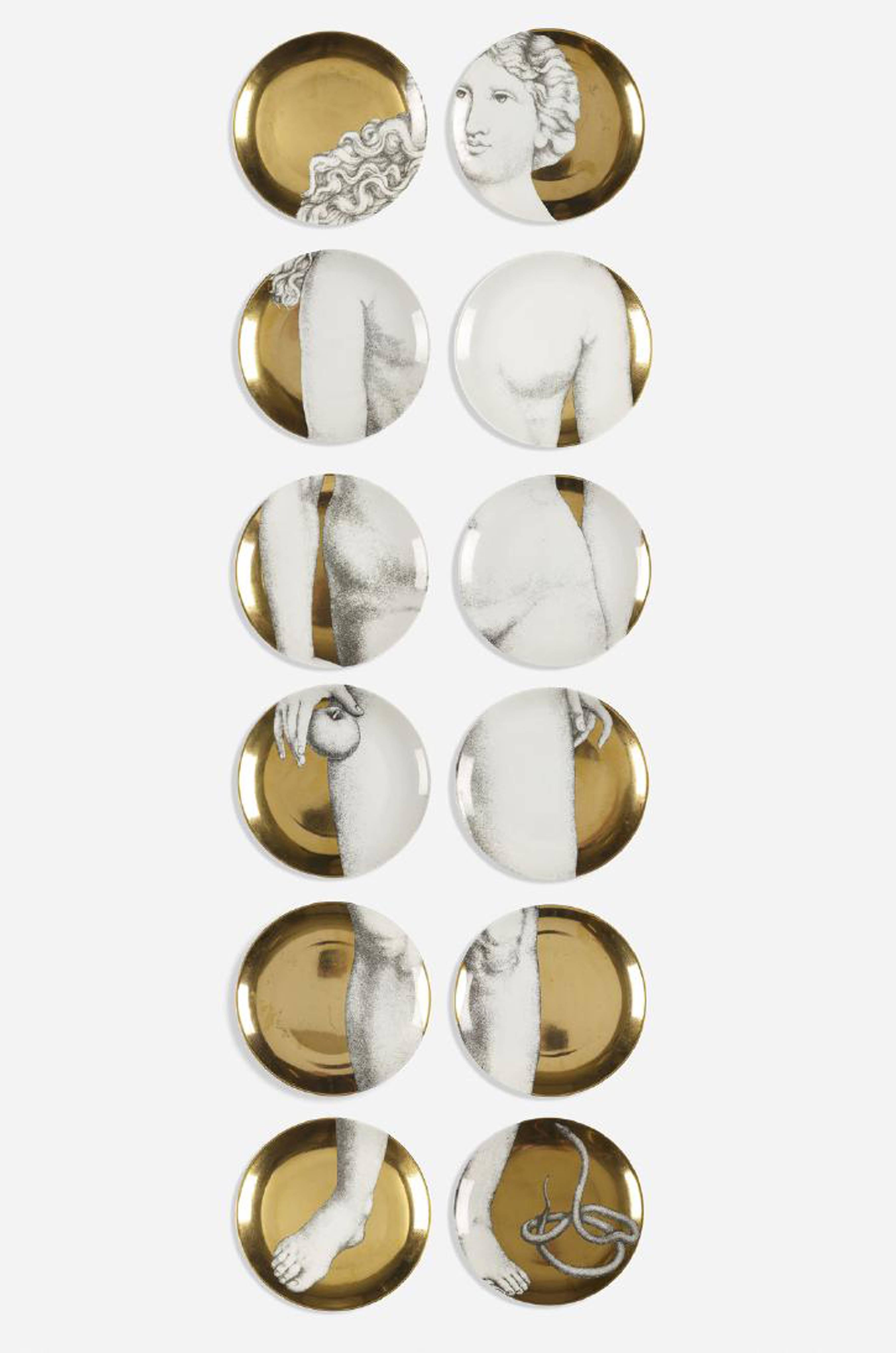24 vintage Piero Fornasetti gold Adam & Eve porcelain plates,
1990.

A complete set of vintage painted gold ground transfer-printed plates which as a group depict Adam & Eve.

Dimensions: 10 1/4 inches diameter

Marks: On bottom, transfer