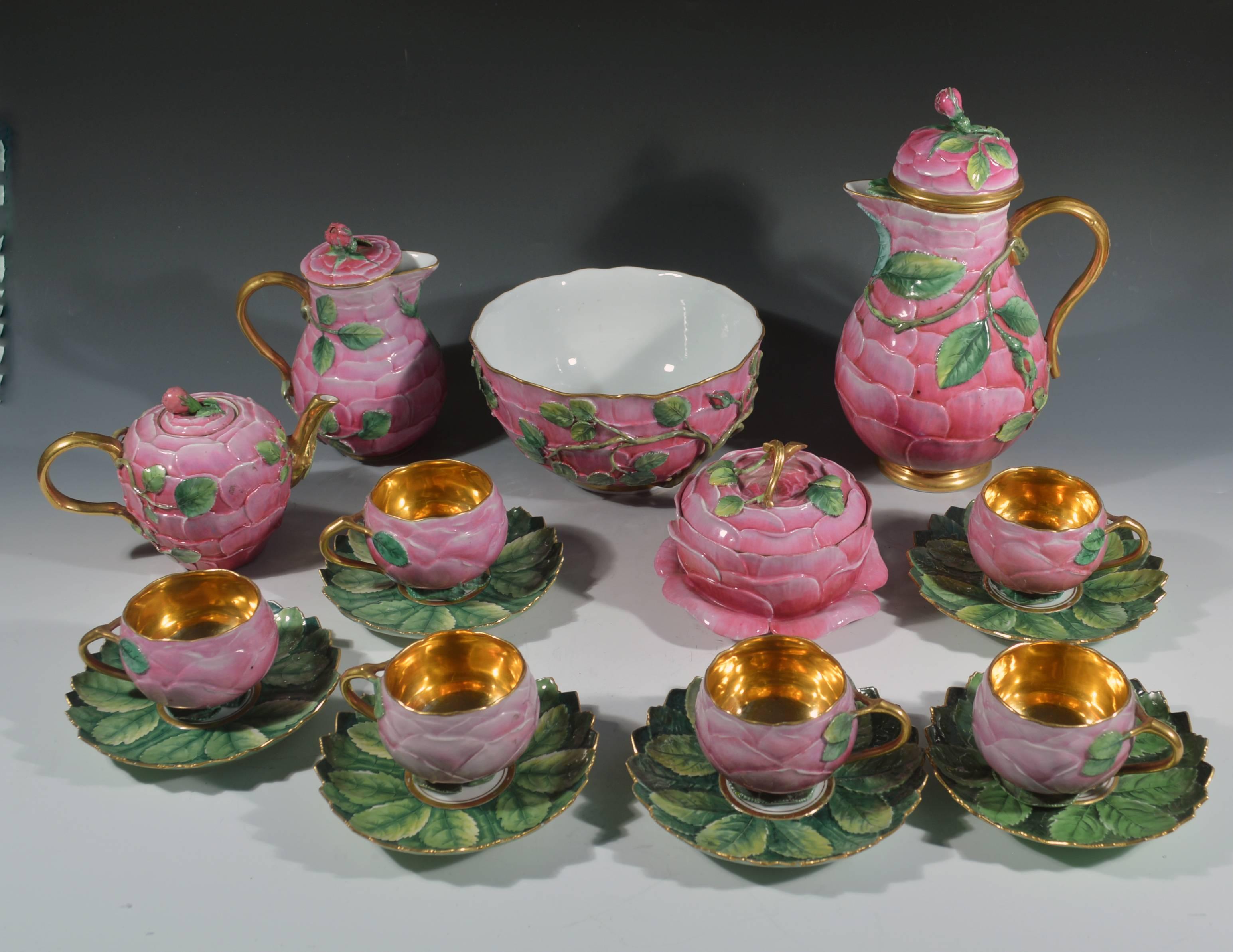 German porcelain Trompe L'oeil Rose tea service,
Attributed to Meissen,
19th century.

The tea service comprises of a hot water pot and cover, a teapot and cover, a hot milk jug and cover, a sugar bowl and cover and six cups and saucers with