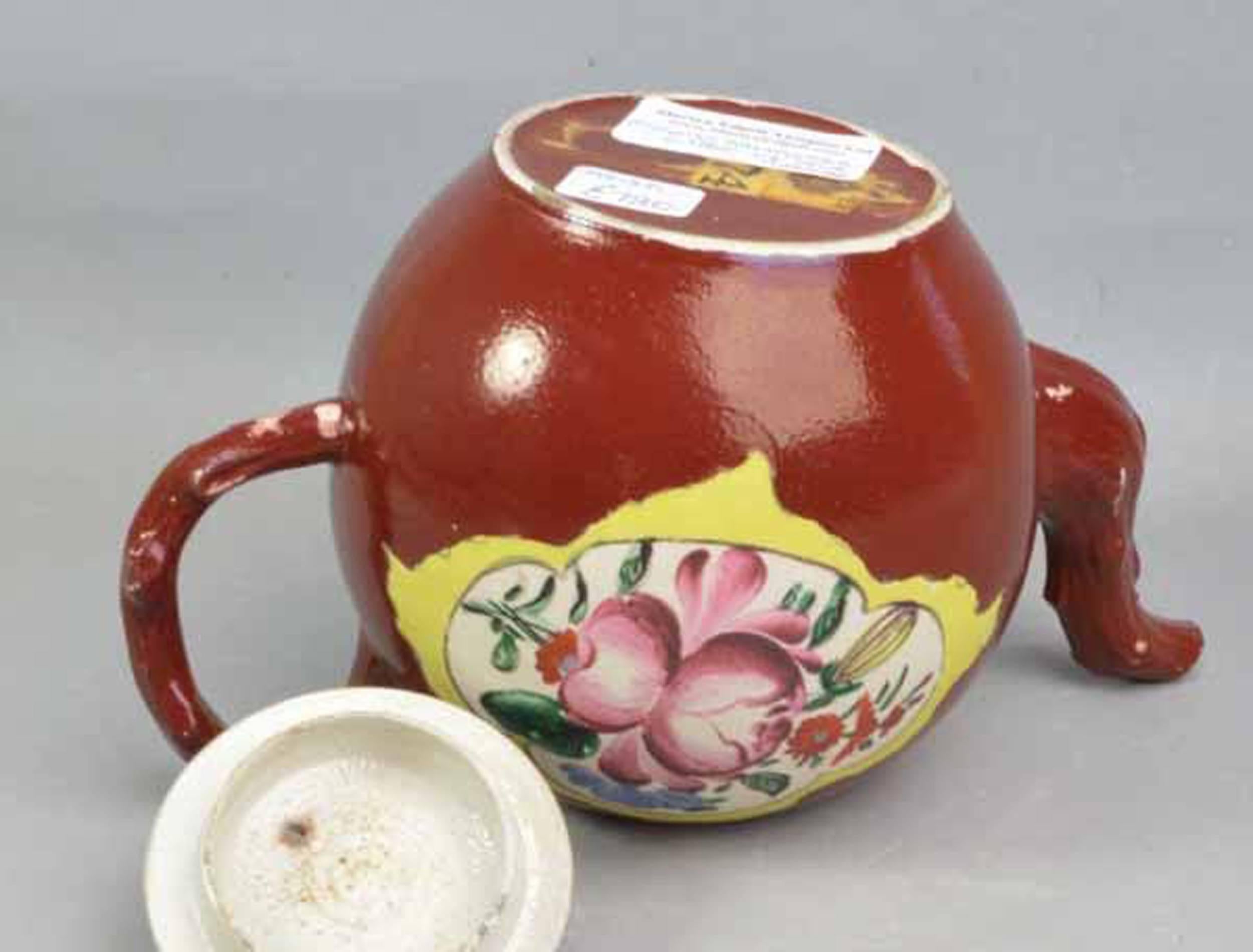 English Plum Red-Ground Saltglaze Stoneware Teapot and Cover, circa 1760