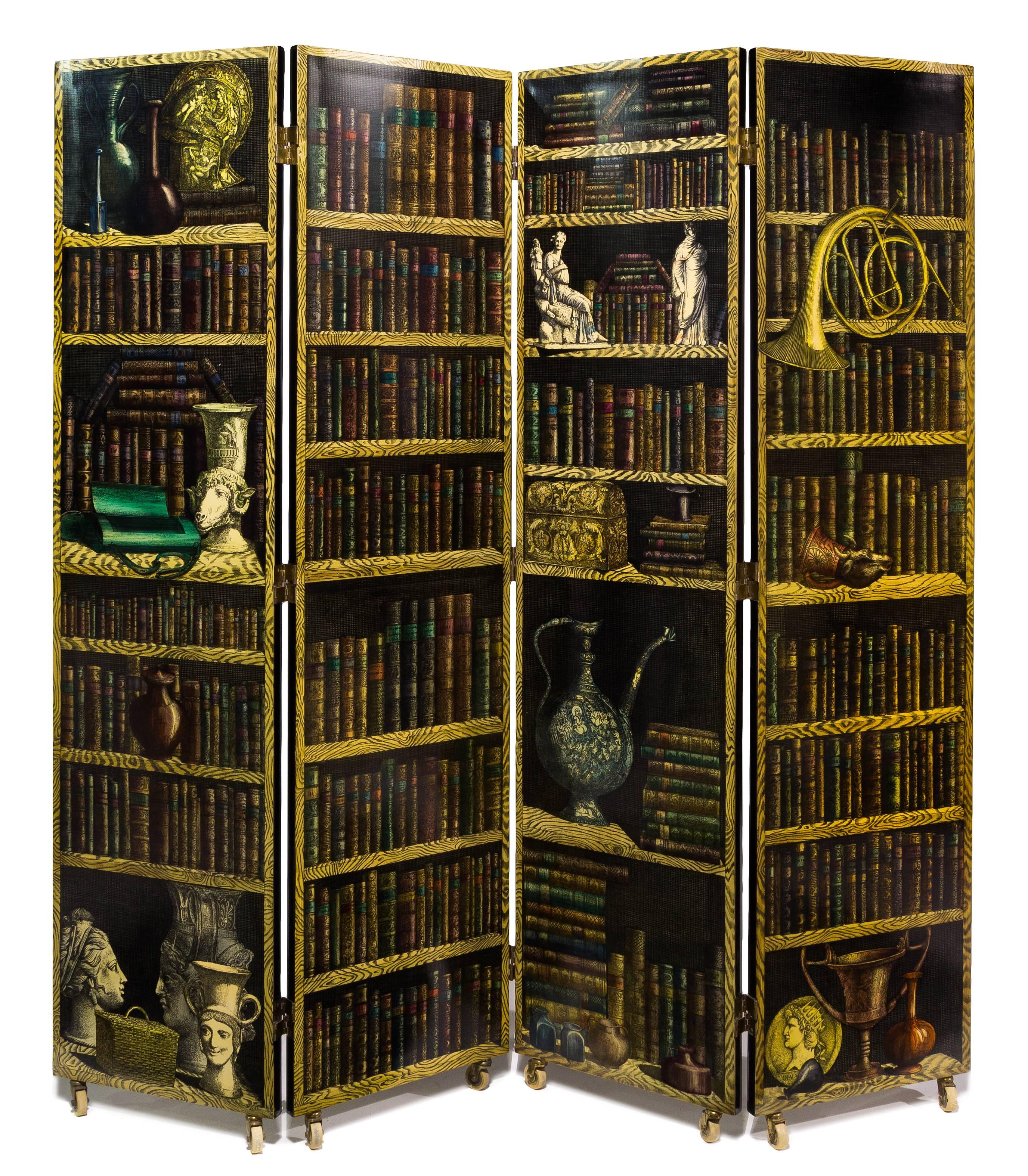 Early Piero Fornasetti Four Panel Folding Screen with La Citta Riflettente to one side and Libreria on reverse, 
1950s.

The screen is in wonderful condition It is double-sided with the Library design to one side and Reflective City to the other.