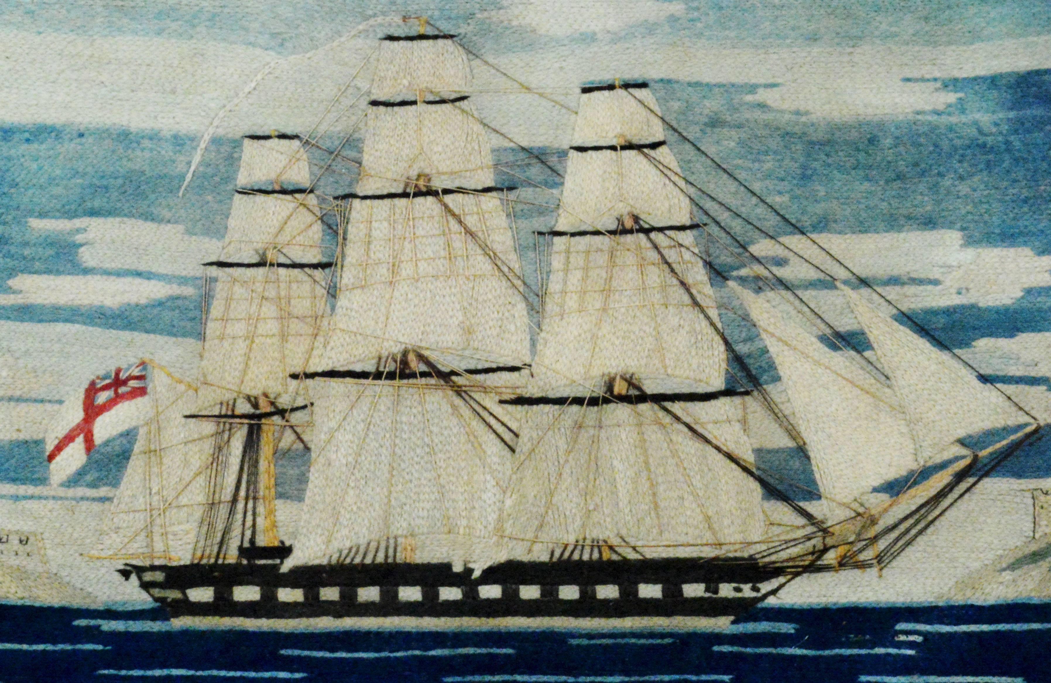 British Sailor's Woolie Woolwork of a Royal Navy ship, 
circa 1865-1875.

The wool depicts a starboard view of a Royal Navy Frigate flying a White Ensign and a long white banner sailing in a channel between a large fort flying a Union Jack on the