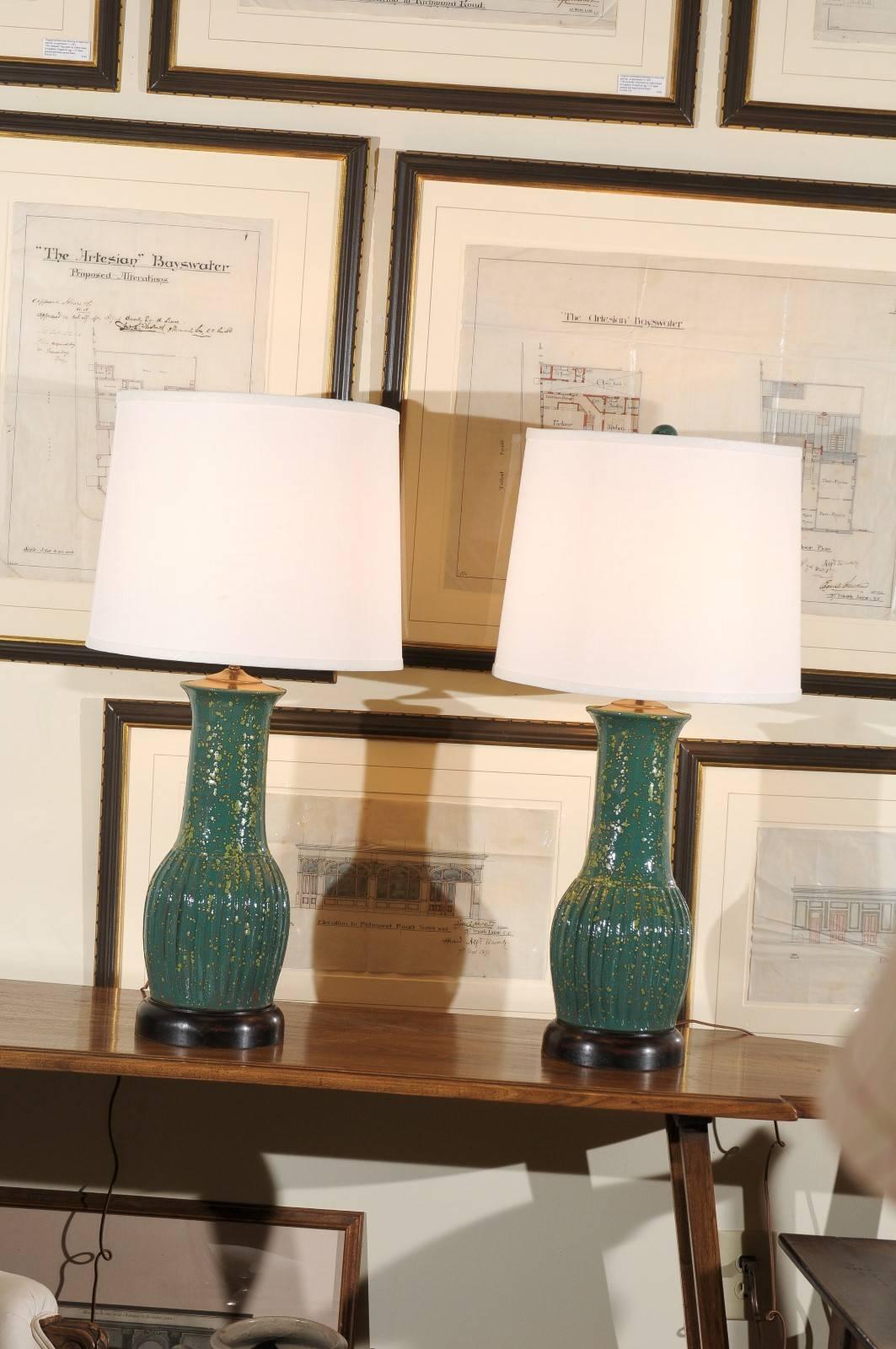 This pair of lamps is made by North Georgia Potter, Charlie West. Charlie has been a potter since 1986. One of the beauties of this handmade pottery is that each piece is unique. Shades are included in the price and other colors can be ordered.