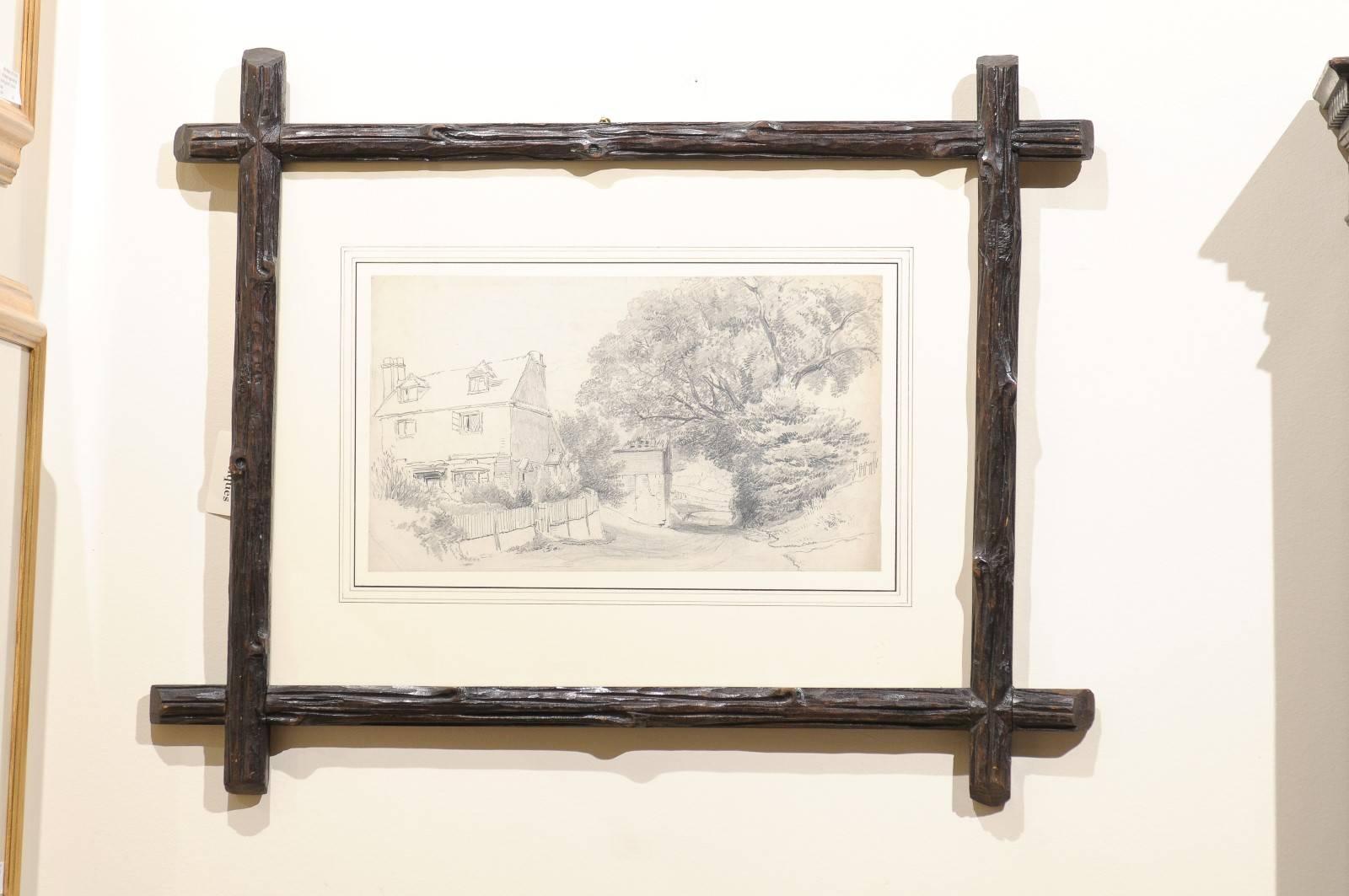 This is an English antique pencil sketch of a house and lane.
It is framed in an antique black forest picture frame. It was framed by Fred Reed Picture Framing. The frame is an antique black forest frame.
 
