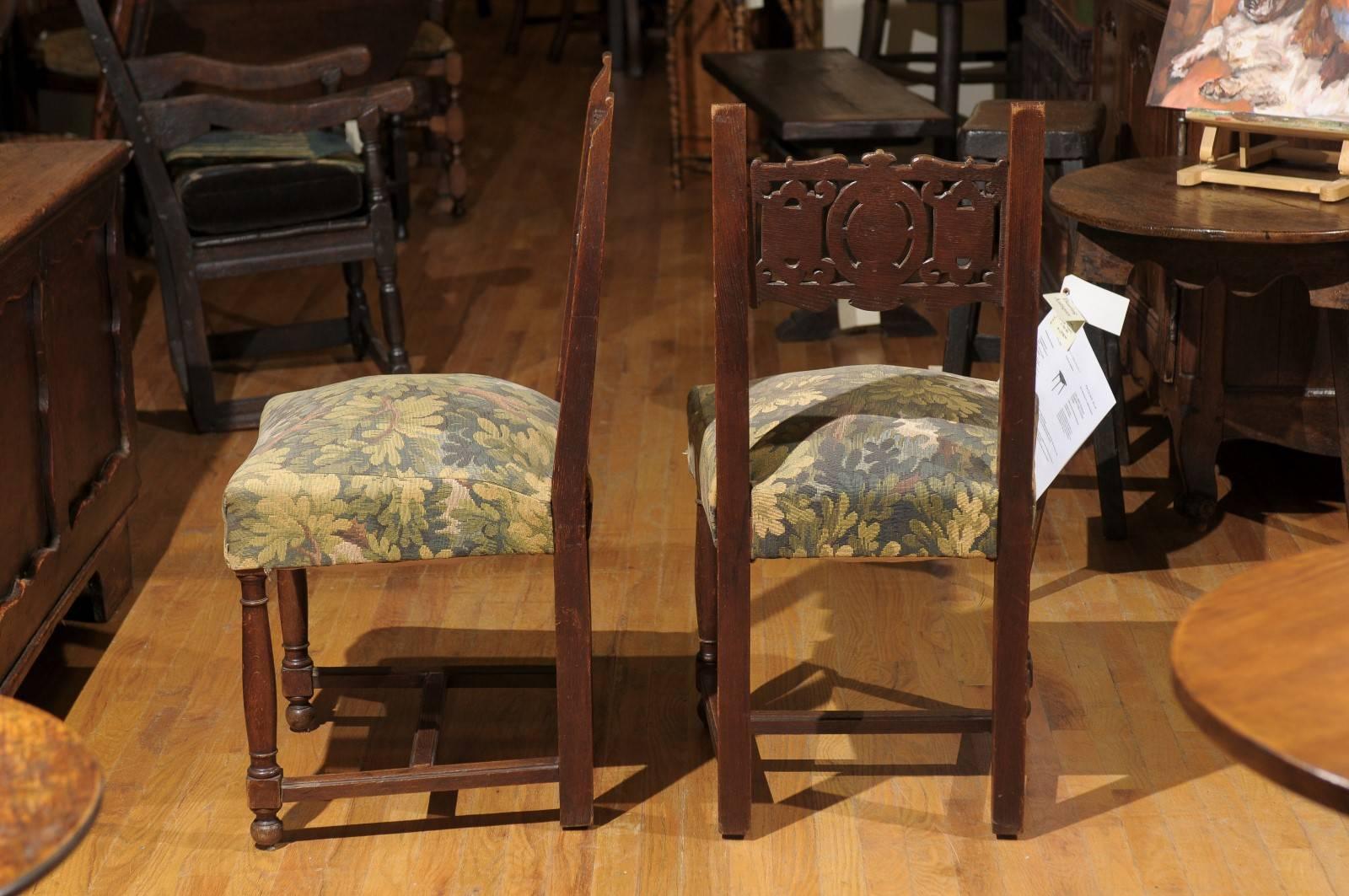 Carved Pair of Upholstered Oak Chairs