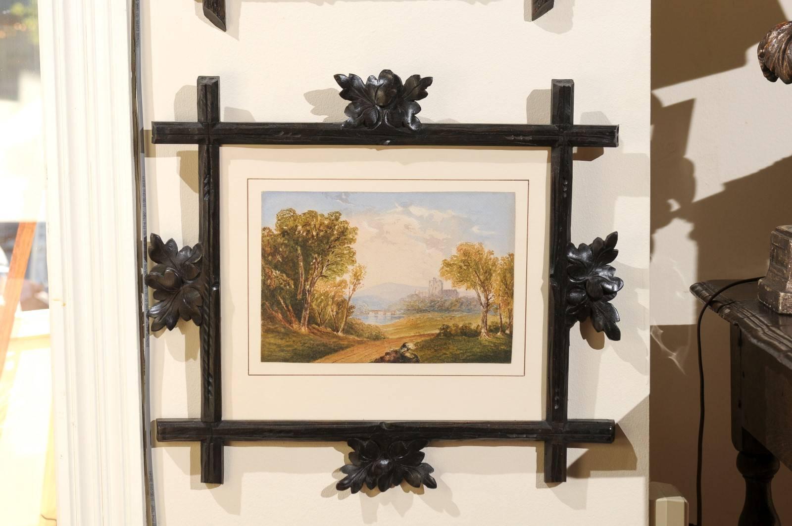 This is a scene from the English Country side. The scene is enhanced by French matting inside a wonderful antique carved black forest frame.