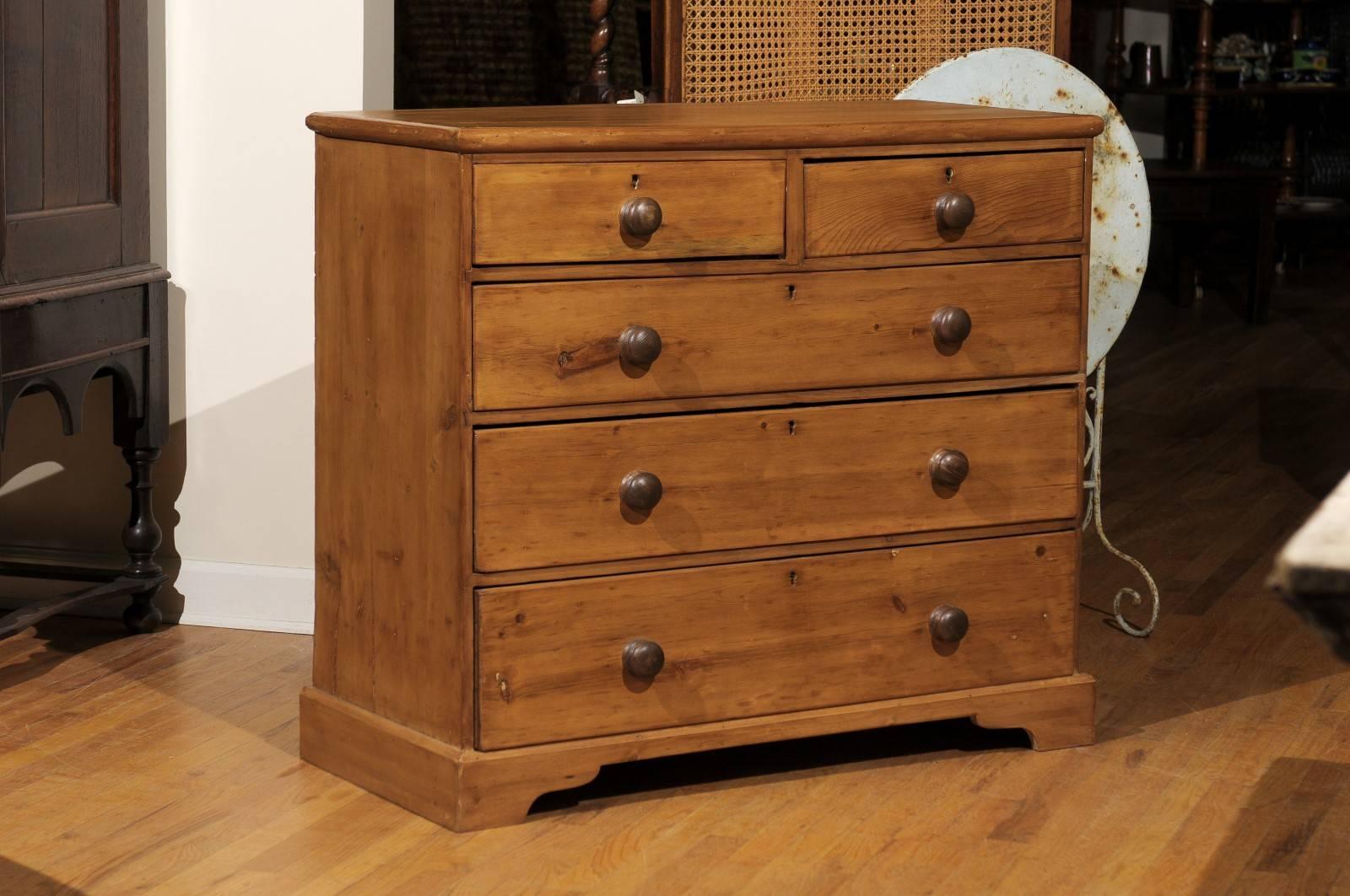 This is a wonderful pine chest made in England. It is two drawers over three which is the most desirable.