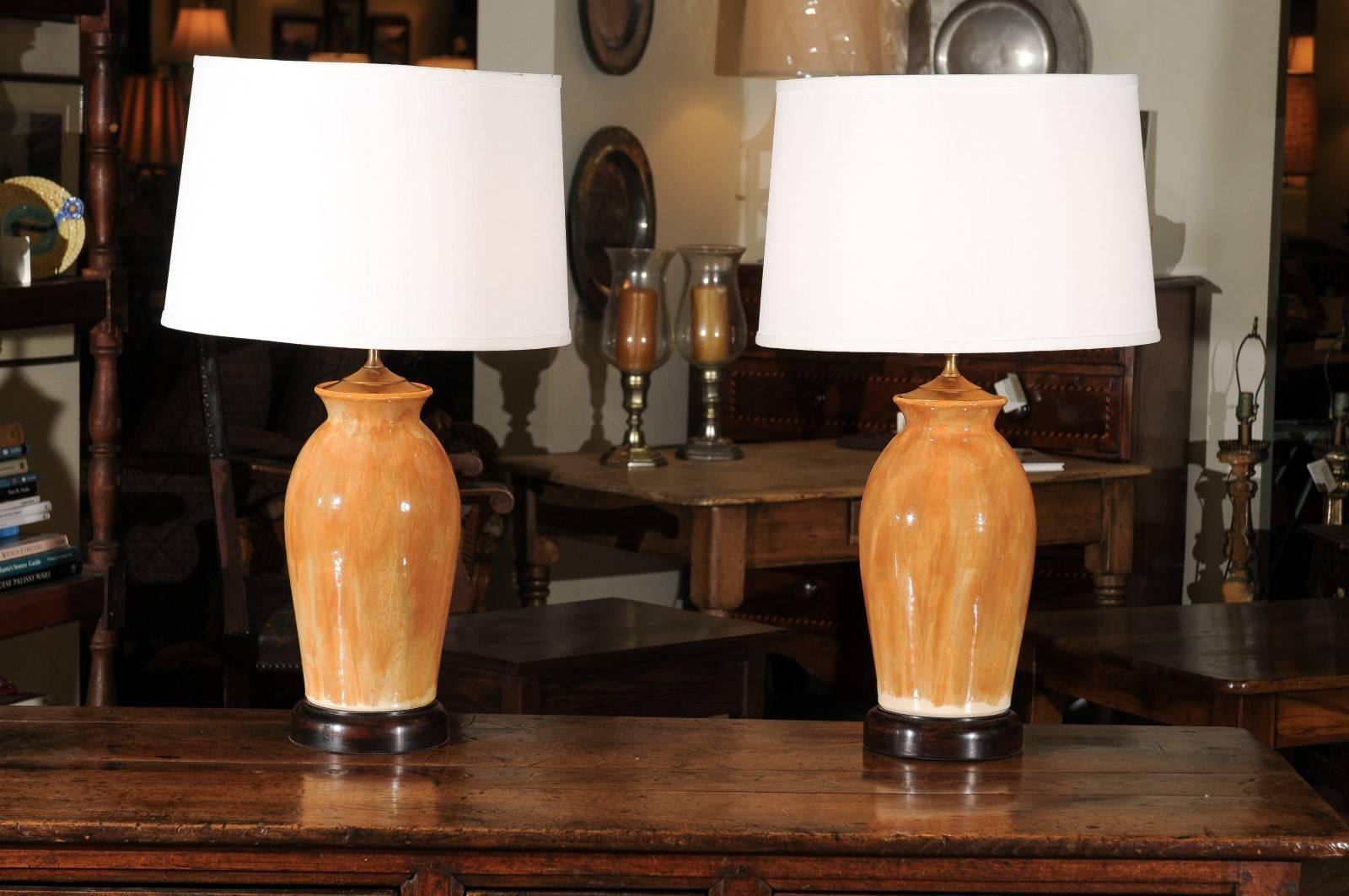 This is a lovely pair of hand-thrown and glazed lamps. The color is one of a kind and can't be replicated. The potter has been in business, since 1986.