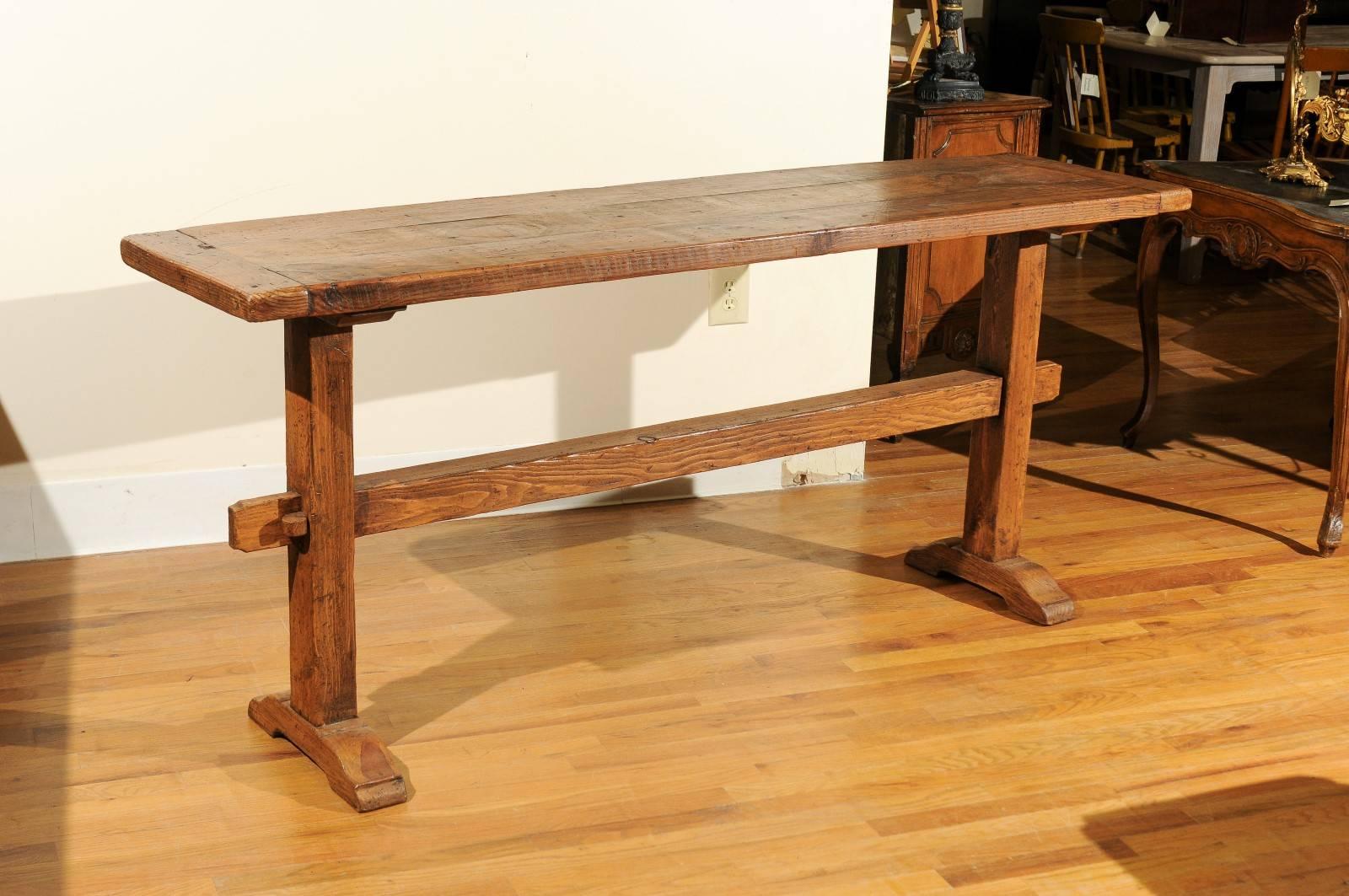 This is a handcrafted newly made table from antique wood. This server could be used behind a sofa, at the foot of a bed, on a screened in porch or many other locations. It is very sturdy.