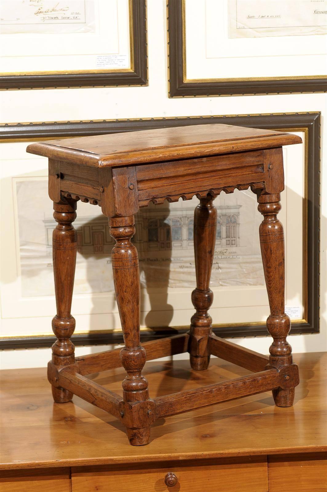 This is an English joint stool from 1890. This would be a wonderful stool or used as a drinks table.