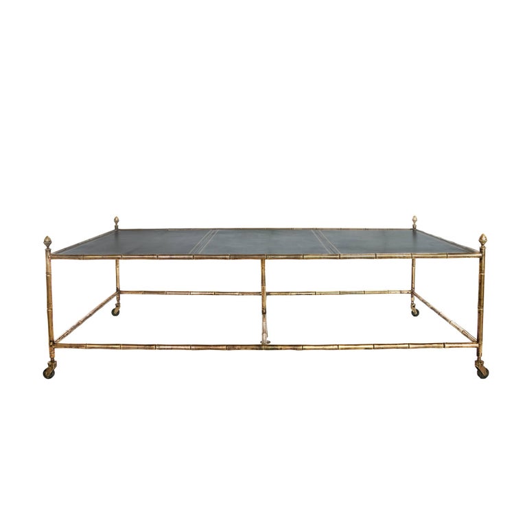 A Rare Over-sized Brass Bamboo Coffee Table with a Leather Top