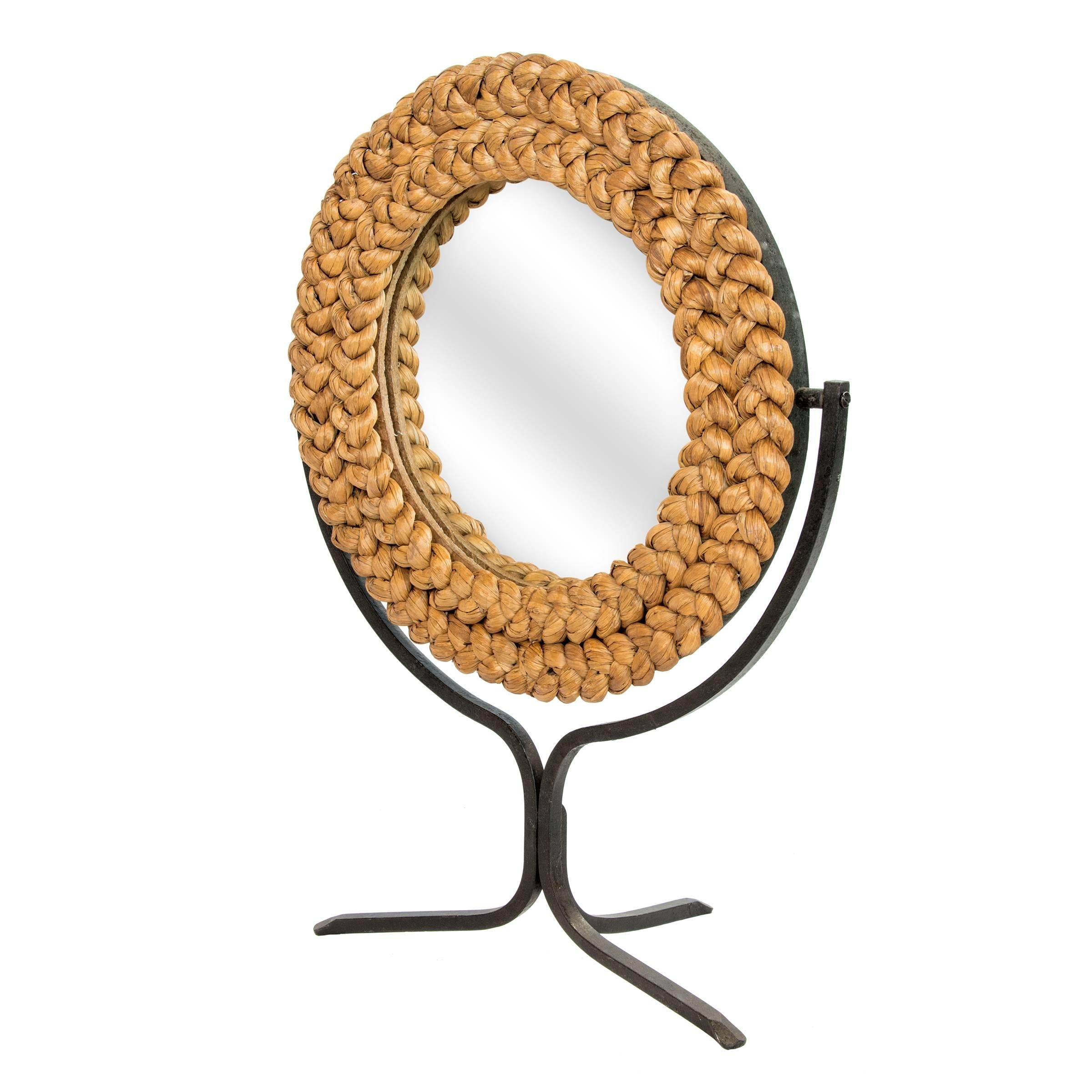 Handmade rope dressing mirror on a tripod black wrought iron stand,

France, circa 1950.