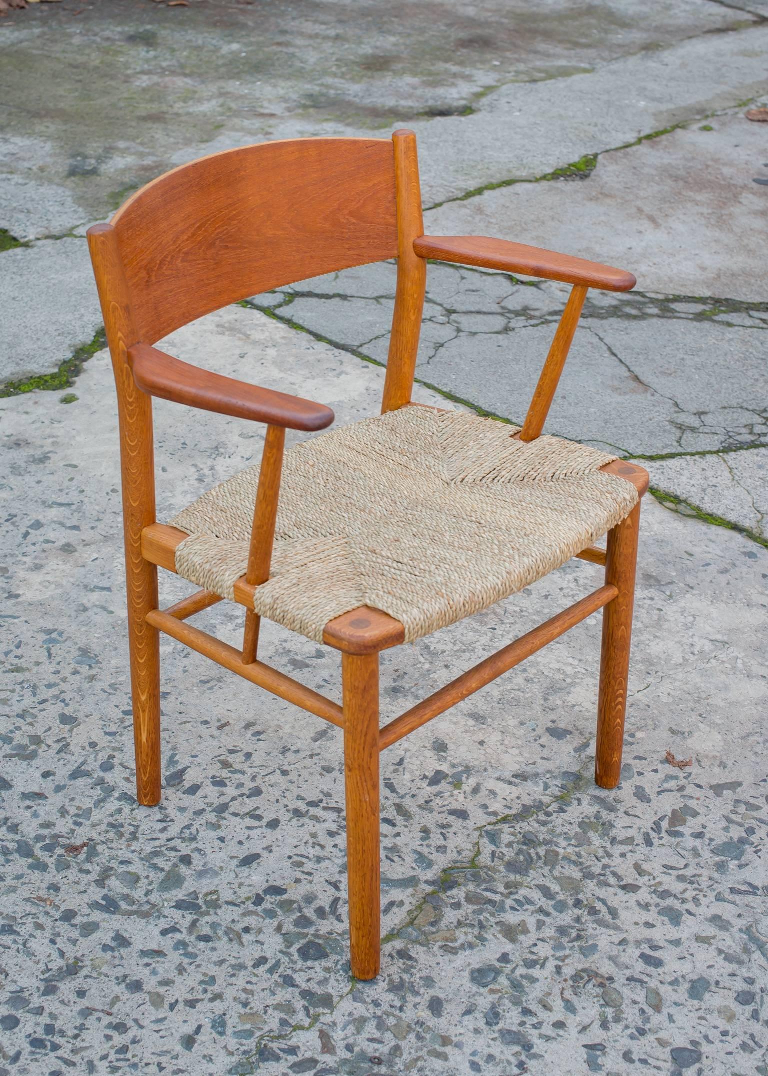 Vintage Borge Mogensen Armchair.
Fully restored armchair by Borge Mogensen (1914-1972), Denmark.
New grass seat on solid teak or oak frame newly stripped, re-oiled and buffed to a soft luster.
All joinery is solid.
Very sturdy design with