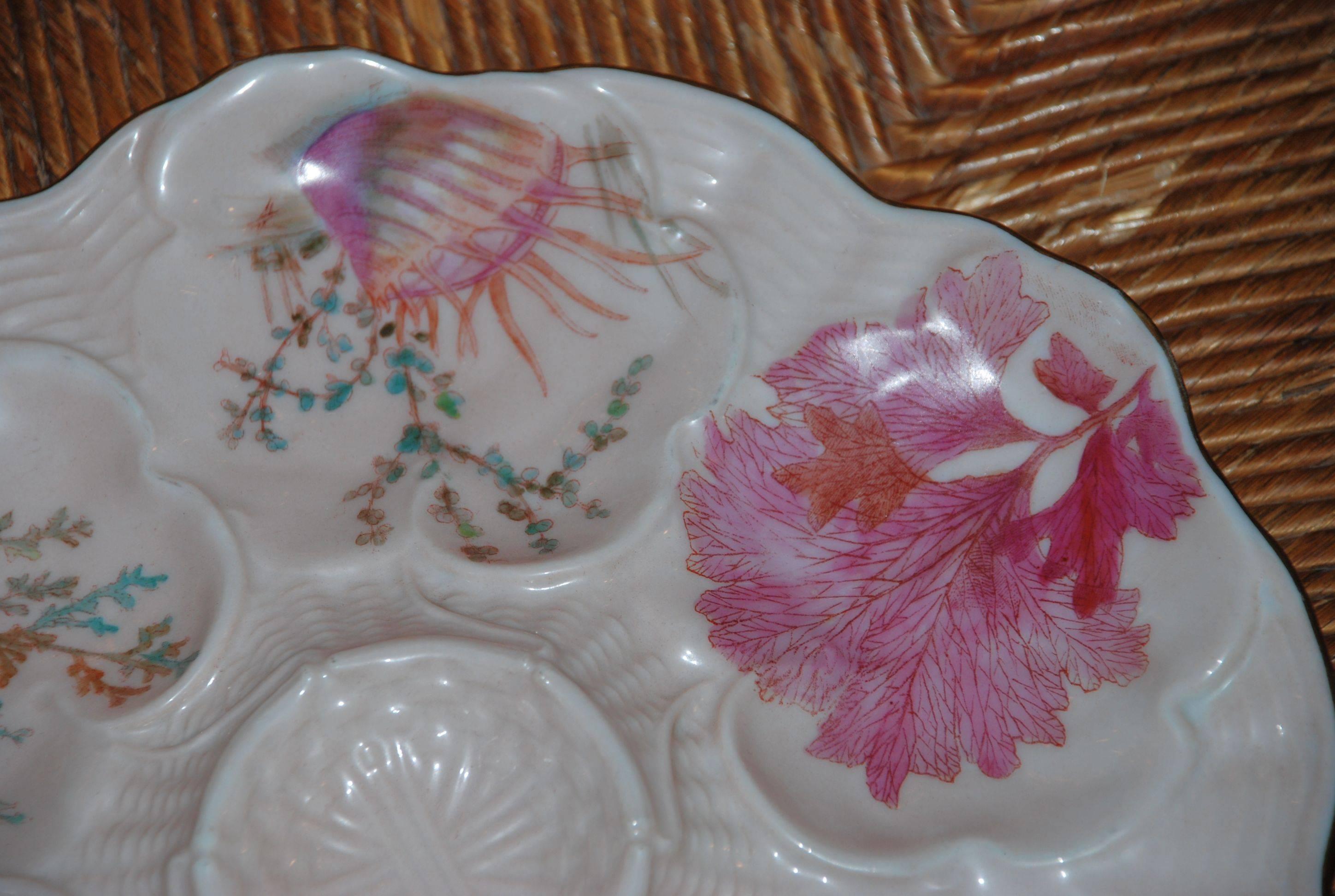 Antique hand-painted porcelain oyster plate.
