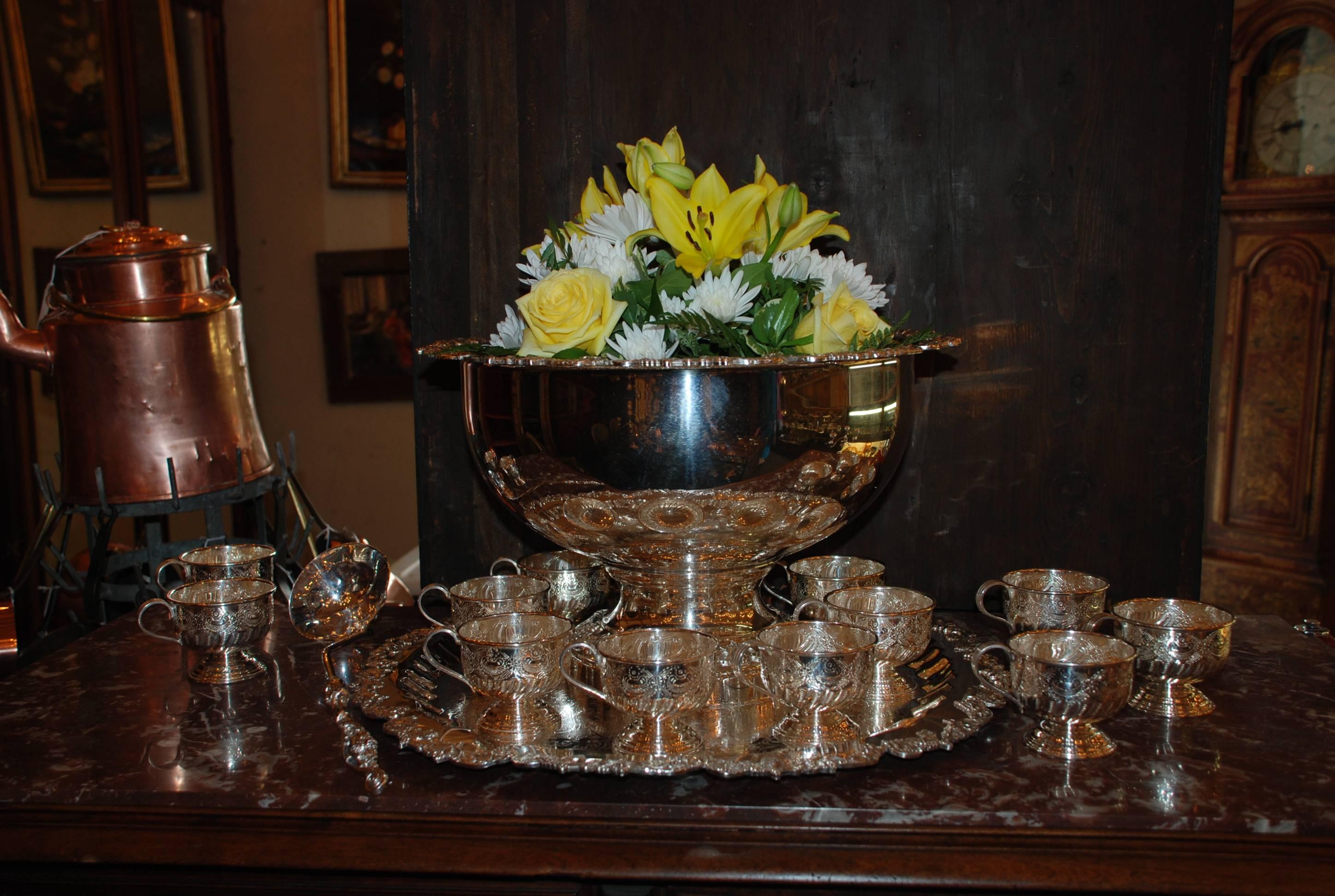 Antique silvered copper grape pattern punch server set for 12 with tray, cups, bowl and ladle.