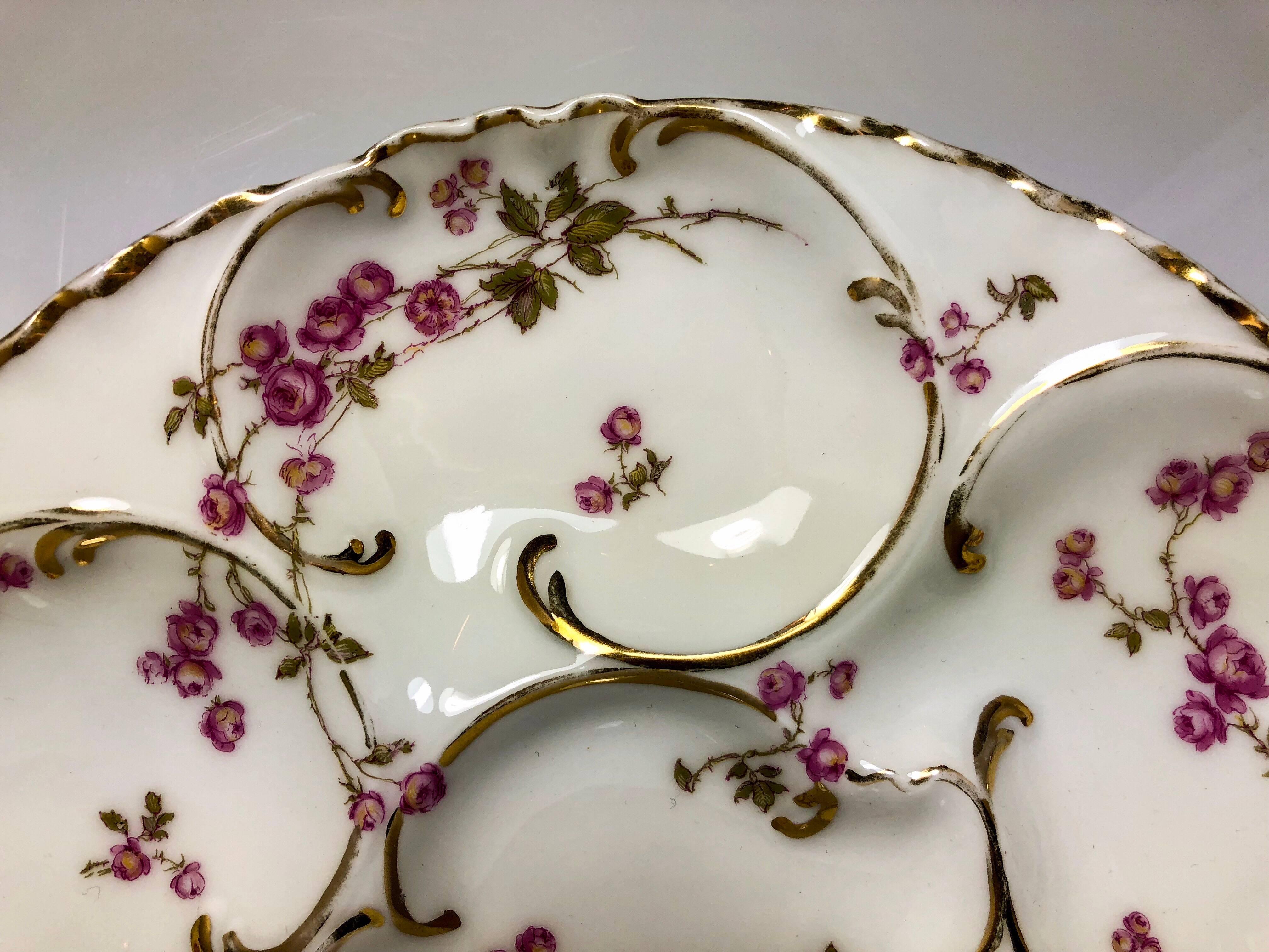 Antique French porcelain oyster plate signed Haviland Company Limoges.