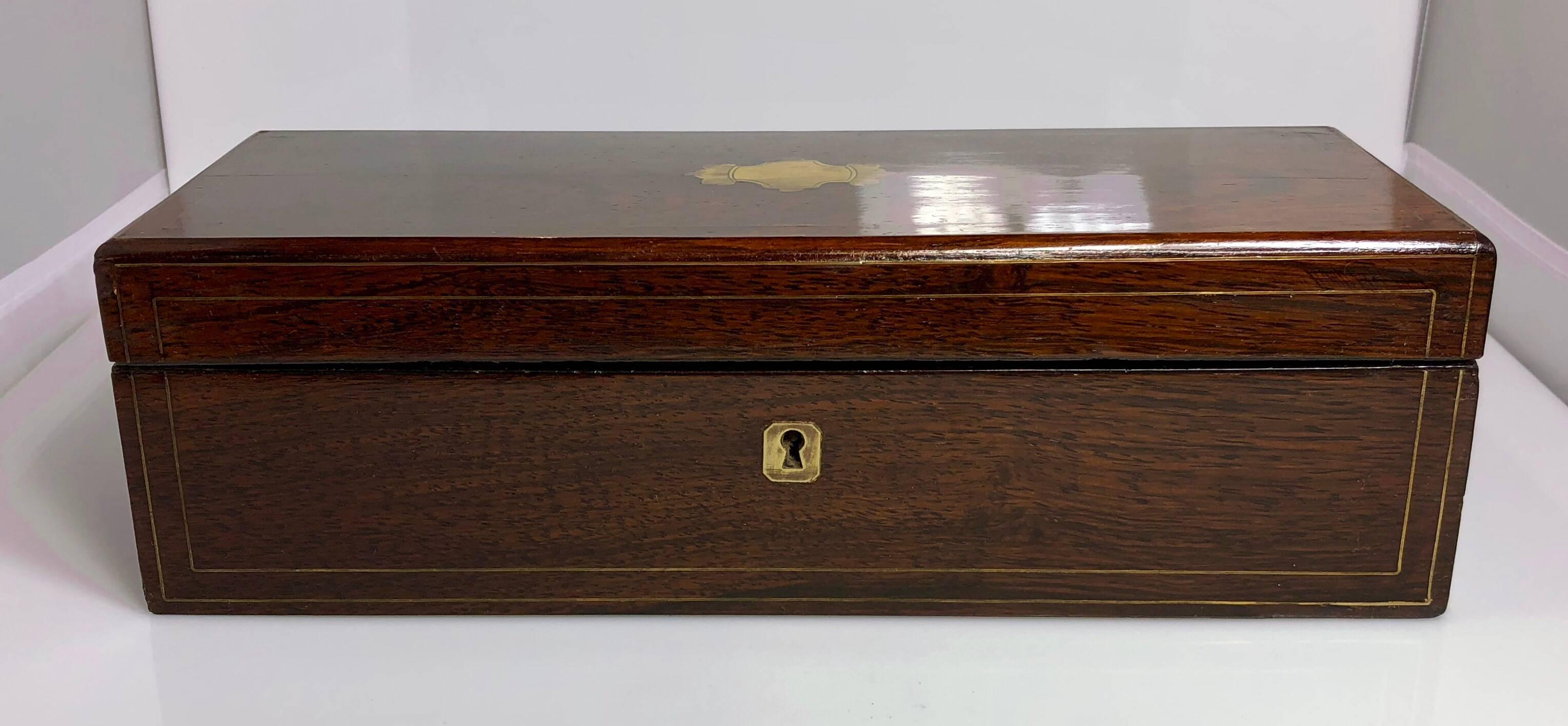 Antique English rosewood glove box with brass inlay, circa 1880.