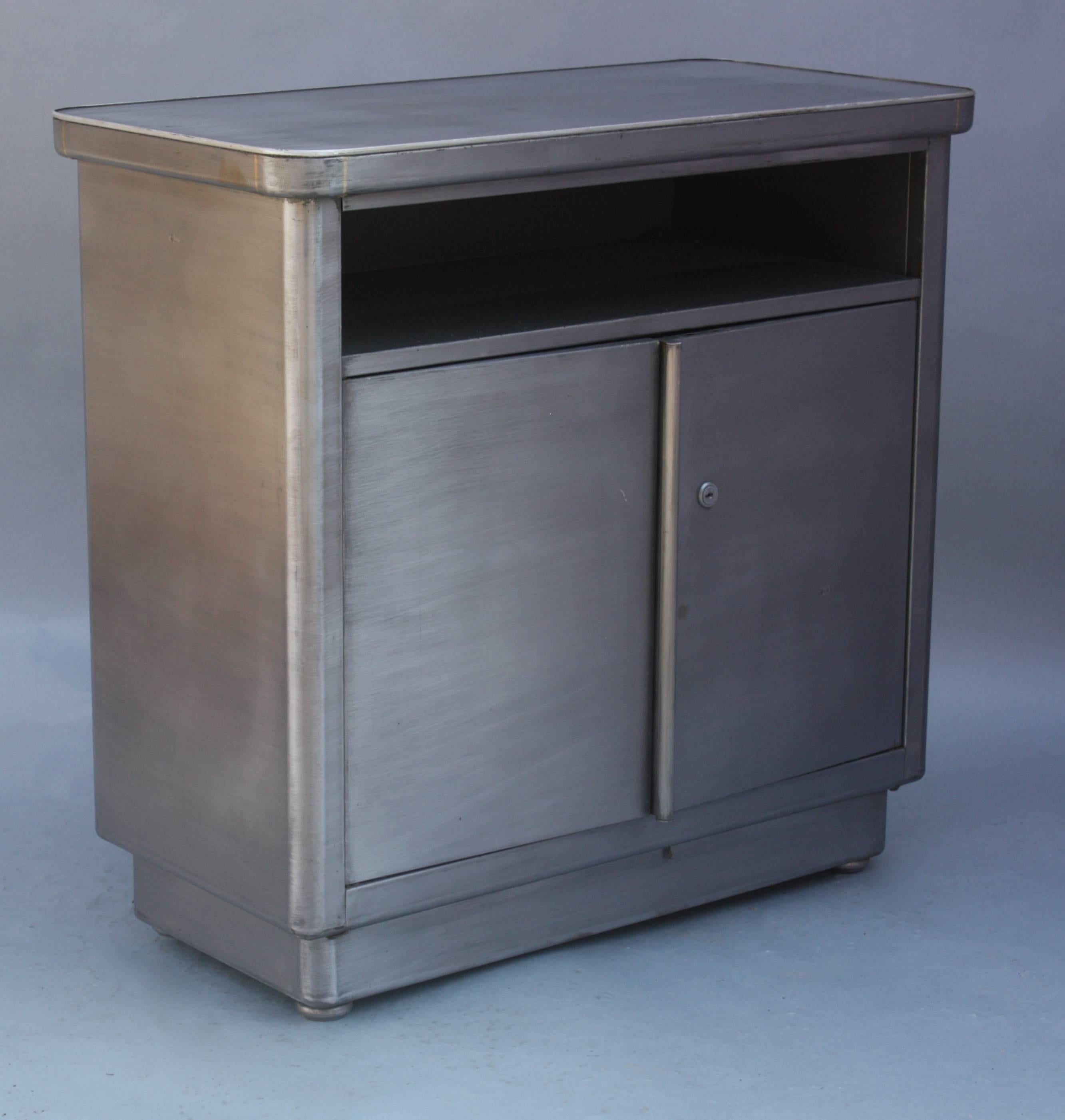 Small metal cabinet, perfect for a TV or stereo.