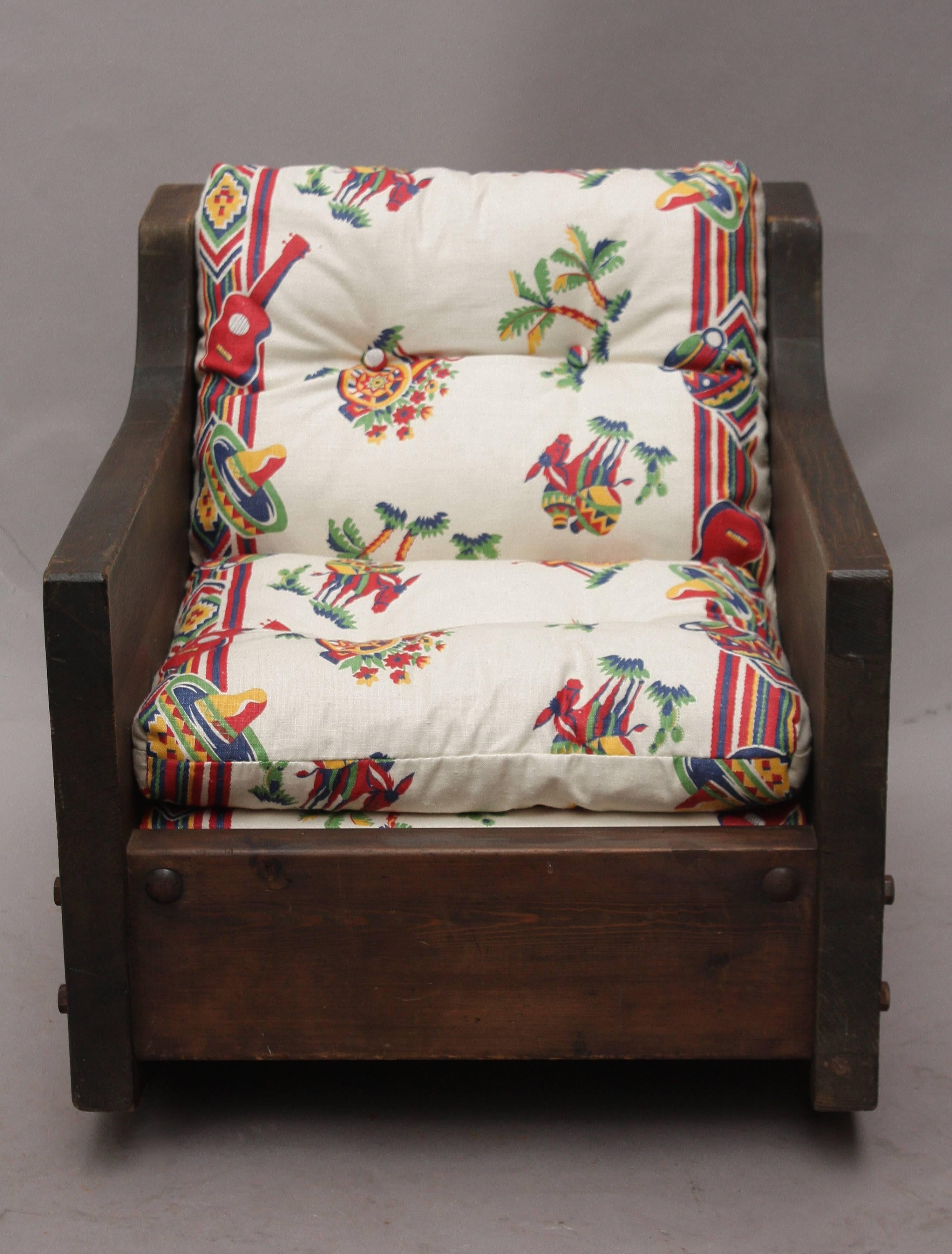 Sweet child's rocker from the turn of the 1930s century with new upholstery. Measures: 17