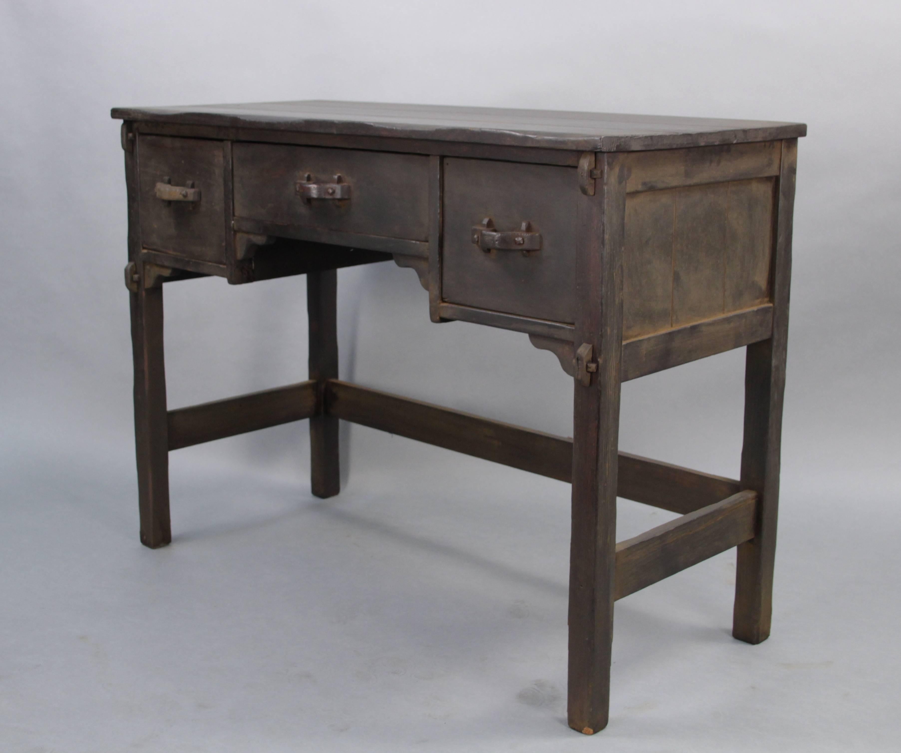 1930s Monterey period desk with three drawers.