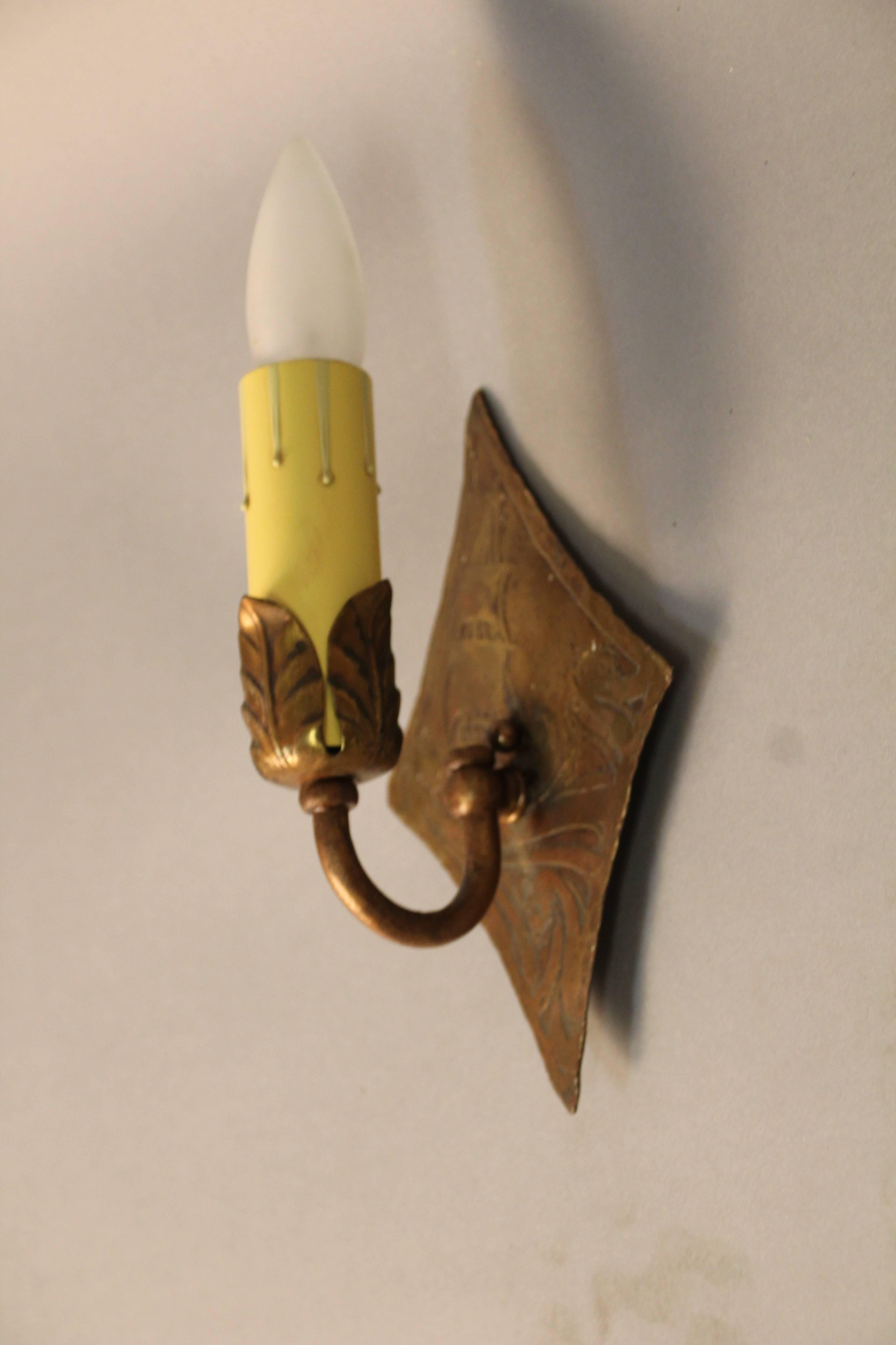Sconces with acanthus bobeche and etched galleon backplate, circa 1920s. Original finish.