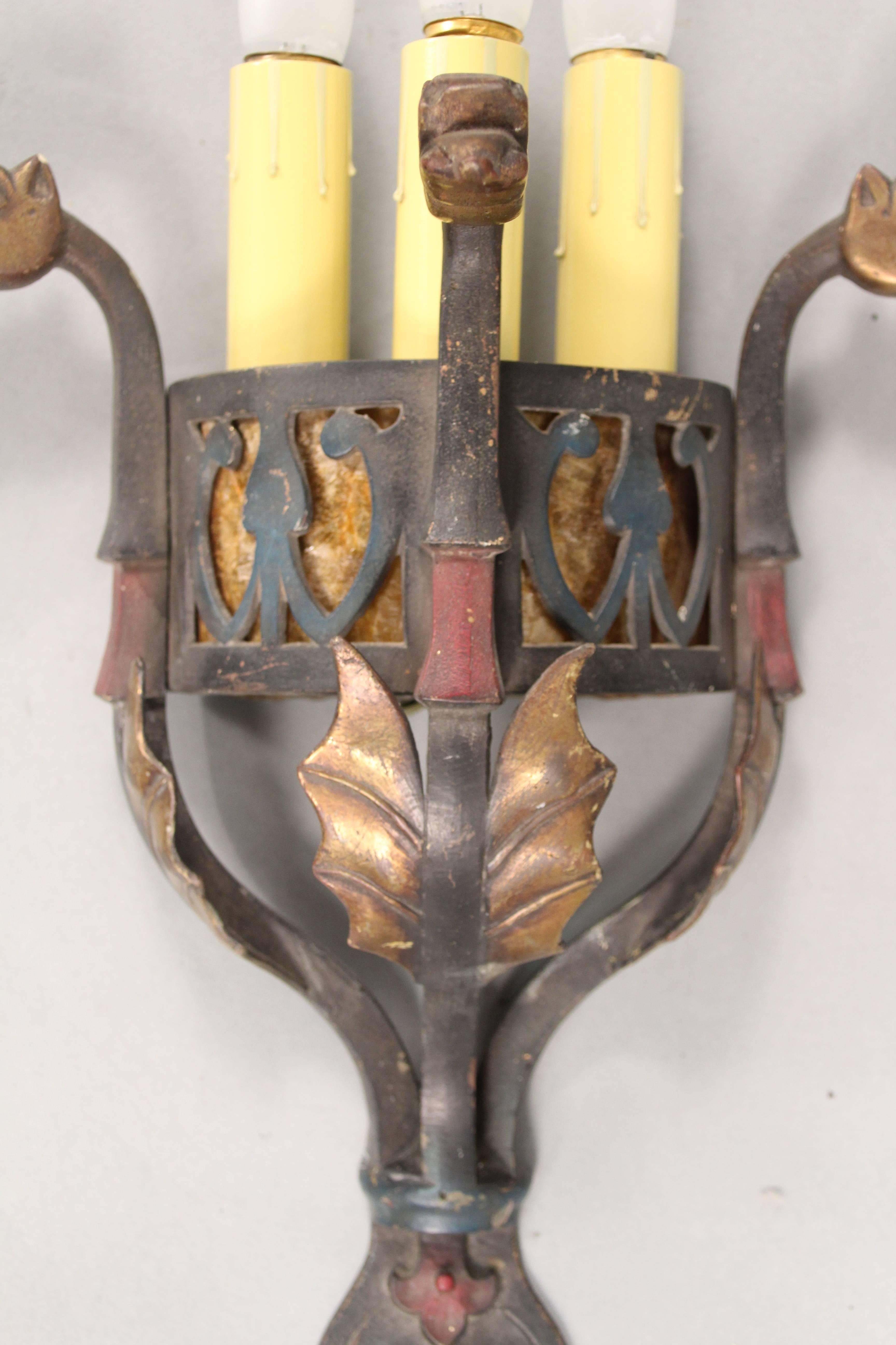 Ornate large-scale sconce with dragon motif attributed to Oscar Bach. Original polychrome finish.