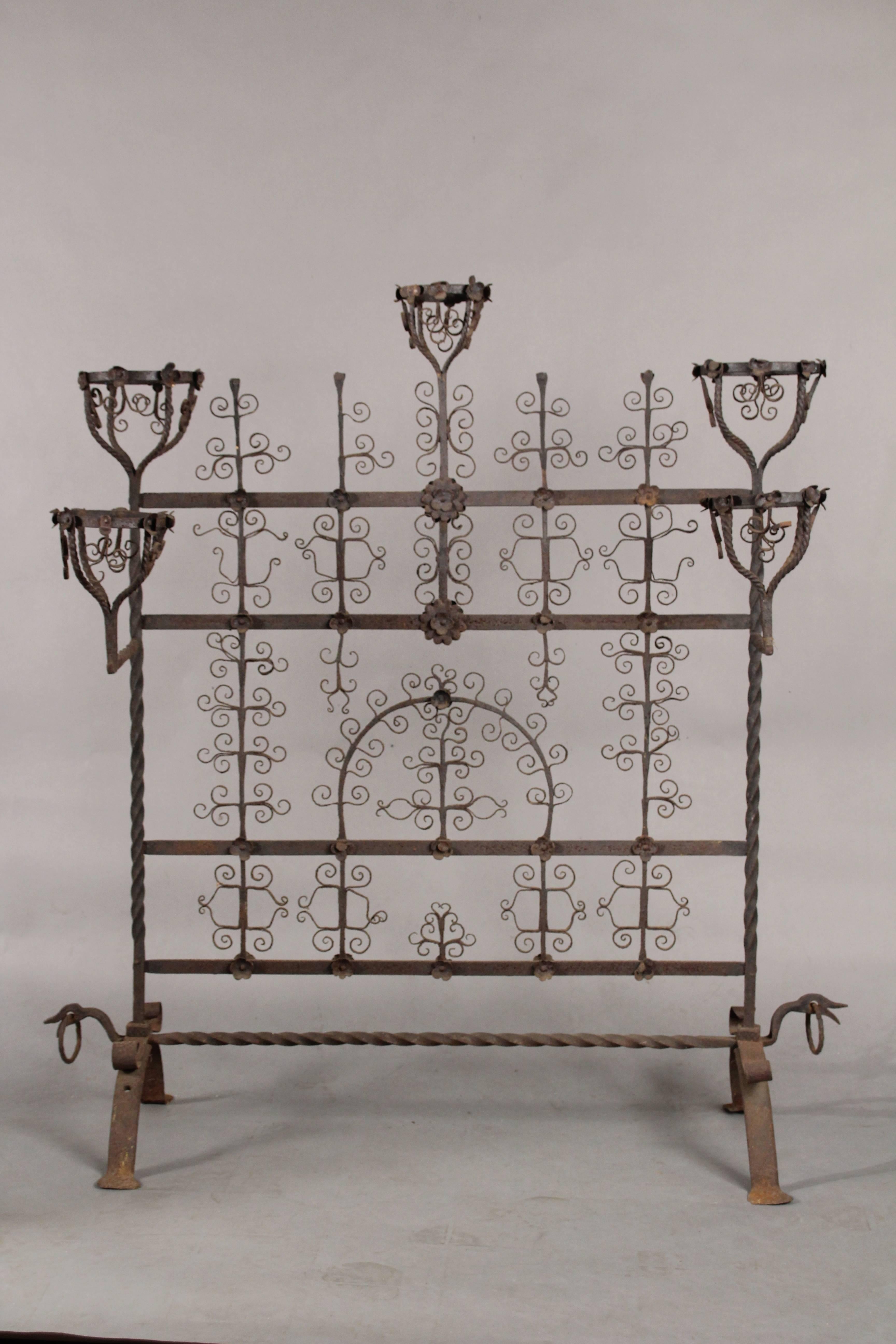 Spectacular wrought iron fire screen with beautiful iron filigree work, late 19th century. Iron scroll missing on top left. Please refer to pictures.