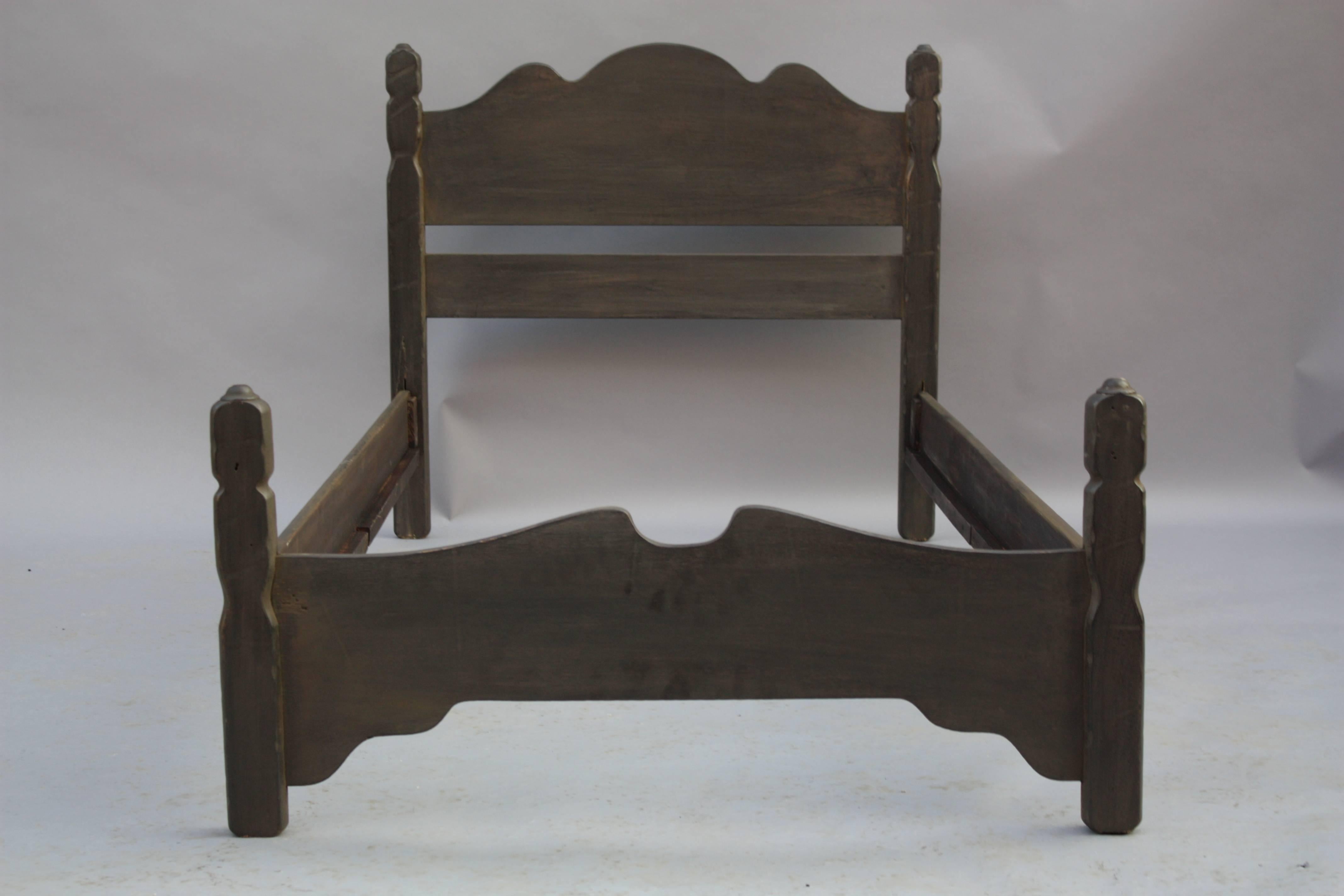 Circa 1930's bed by Barker Bros cie stamped Monterey with horseshoe mark. Restored finish. 
Inside measurements are 38.75 