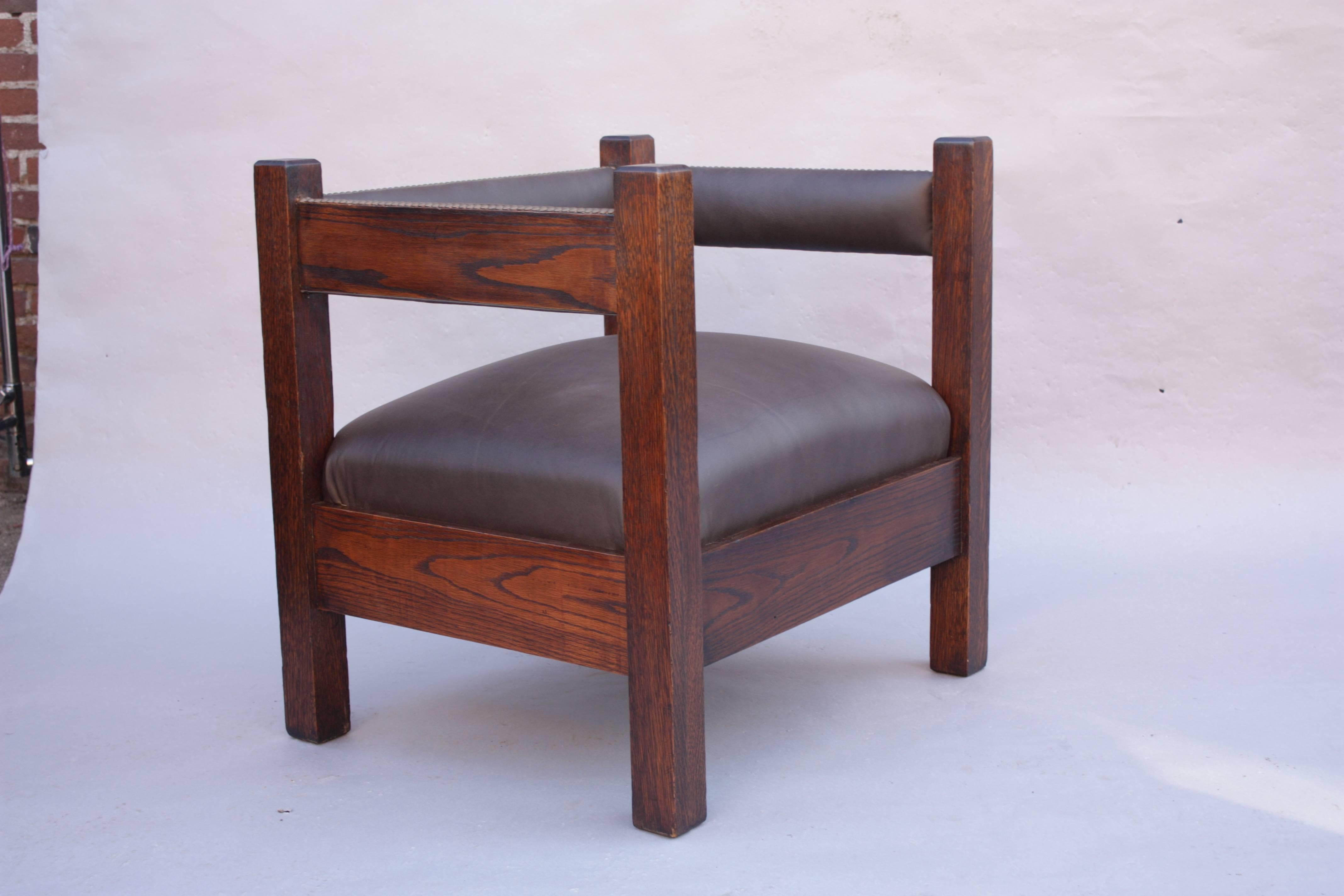 Circa 1910 arts and crafts chair. New leather upholstery. 30.5