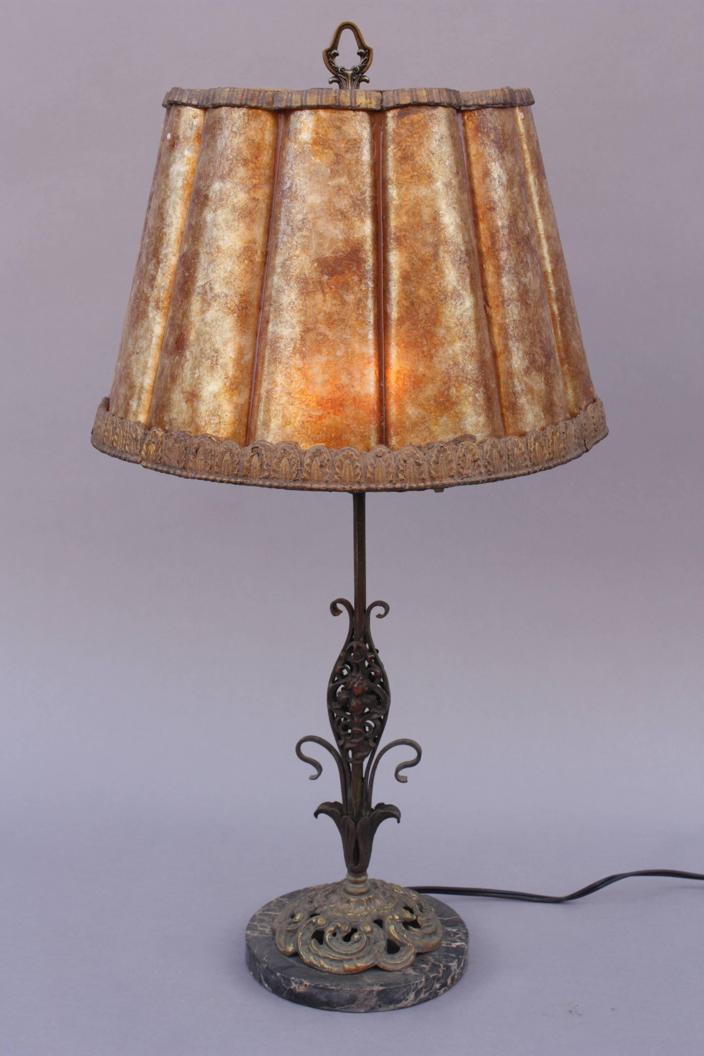 Circa 1920's table lamp with original polychrome finish and marble base.
