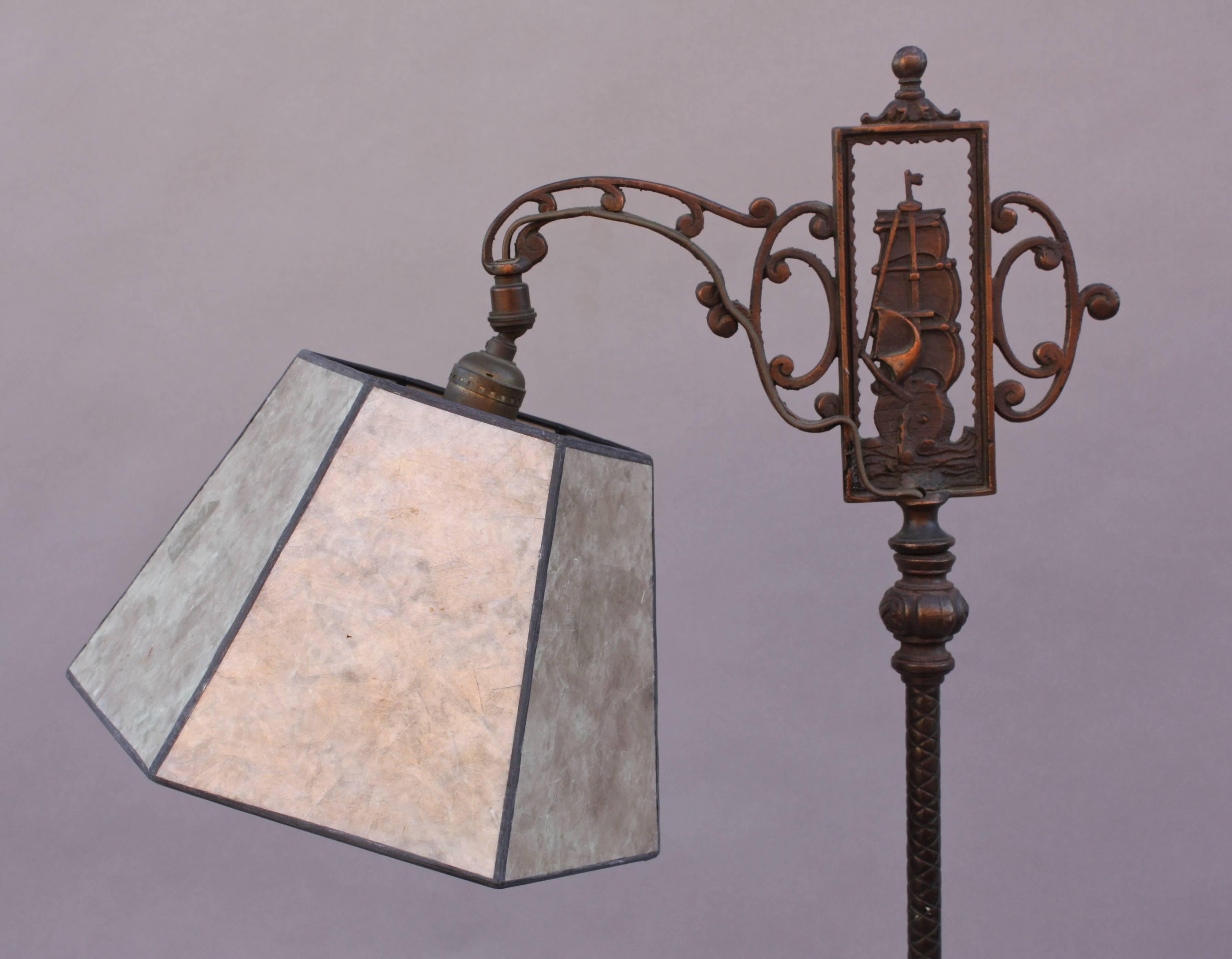 Original 1920s floor lamp with Spanish ship motif. New mica shade.