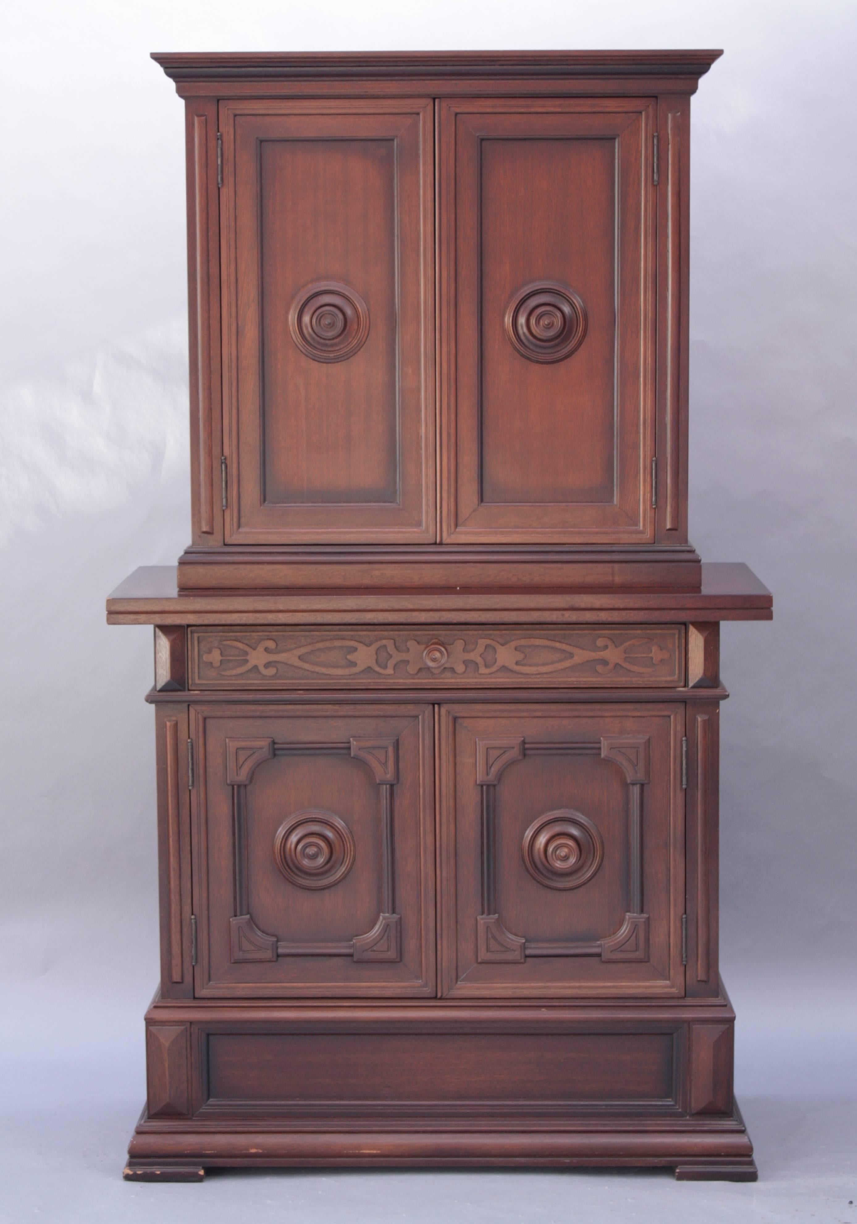 1920s Spanish Revival cabinet with four large cupboard doors and a single, long drawer.