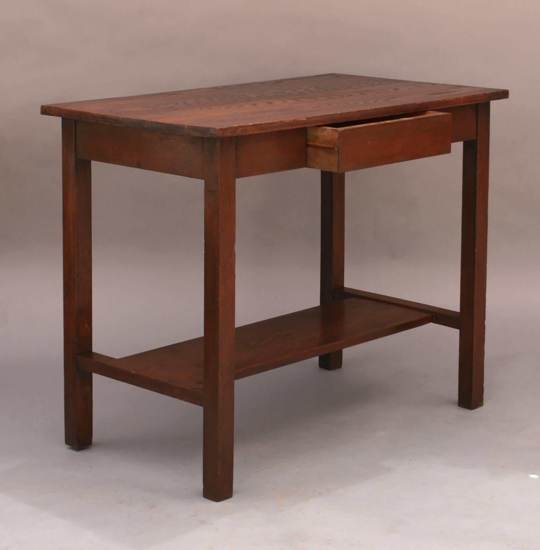 Arts & Crafts table/ desk with single drawer, circa 1910.