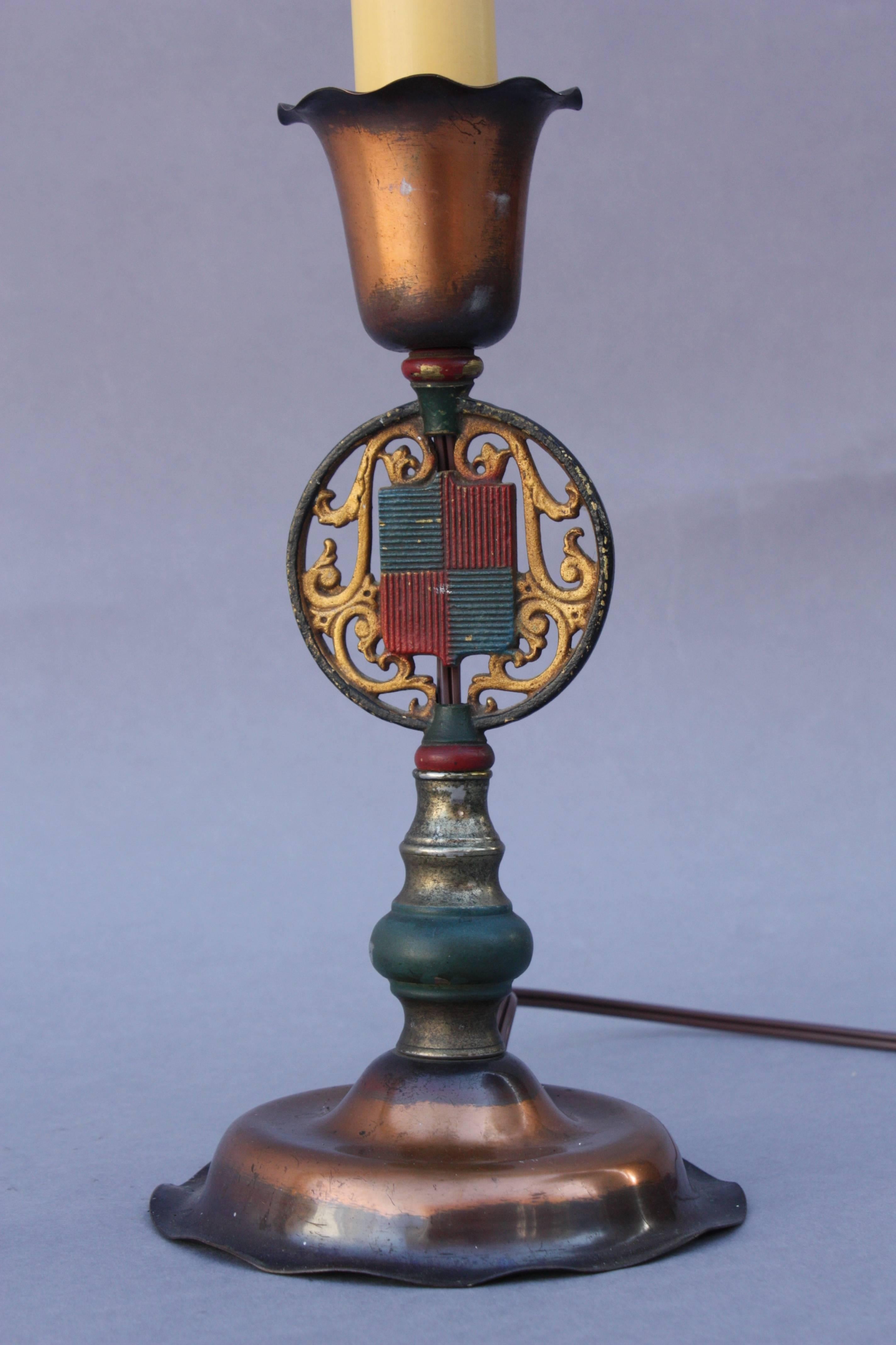 Spanish Revival table lamp with crest design, circa 1920s.