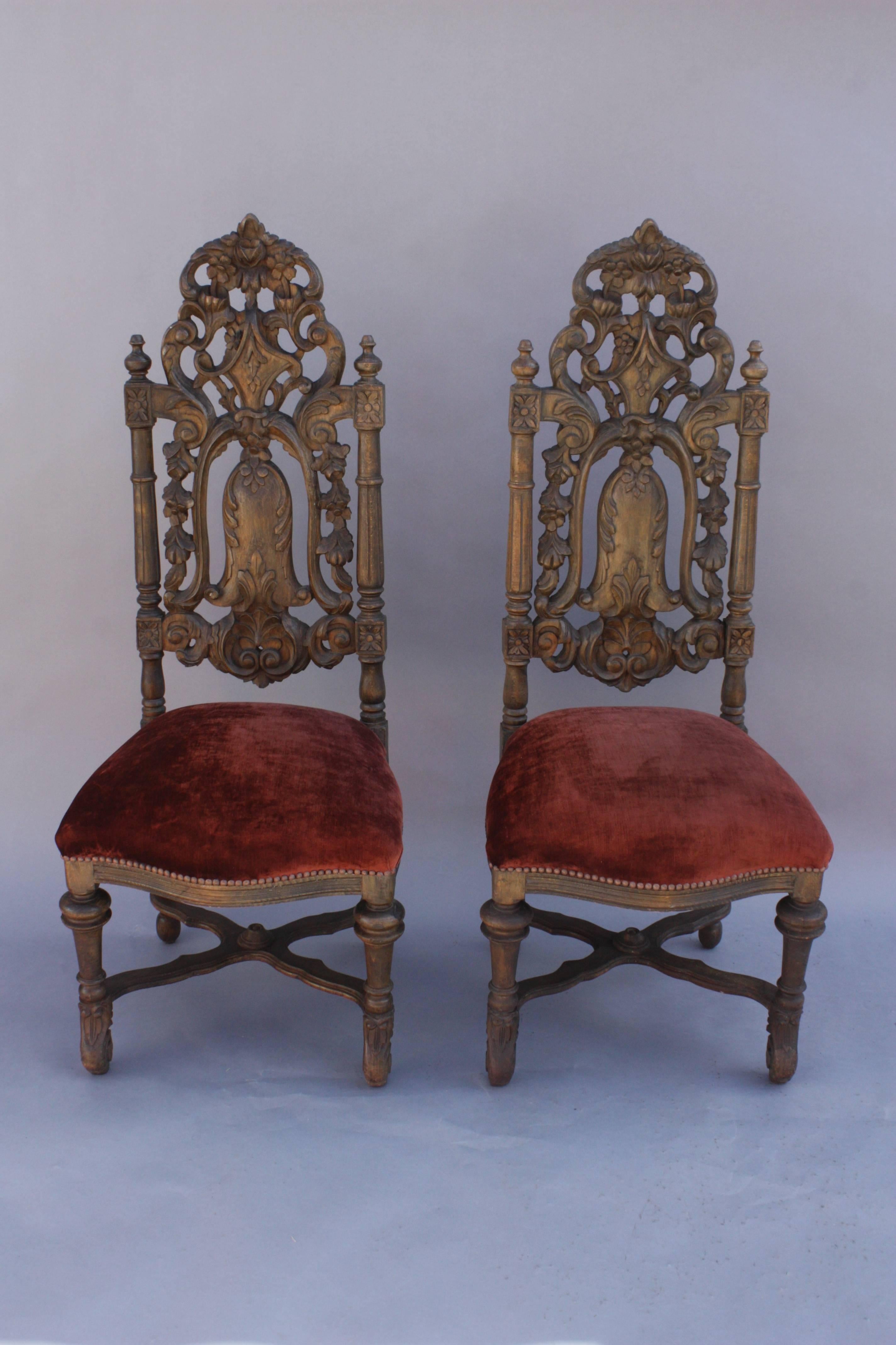 Pair of carved tall back chairs. New velvet upholstery, circa 1920s.

   