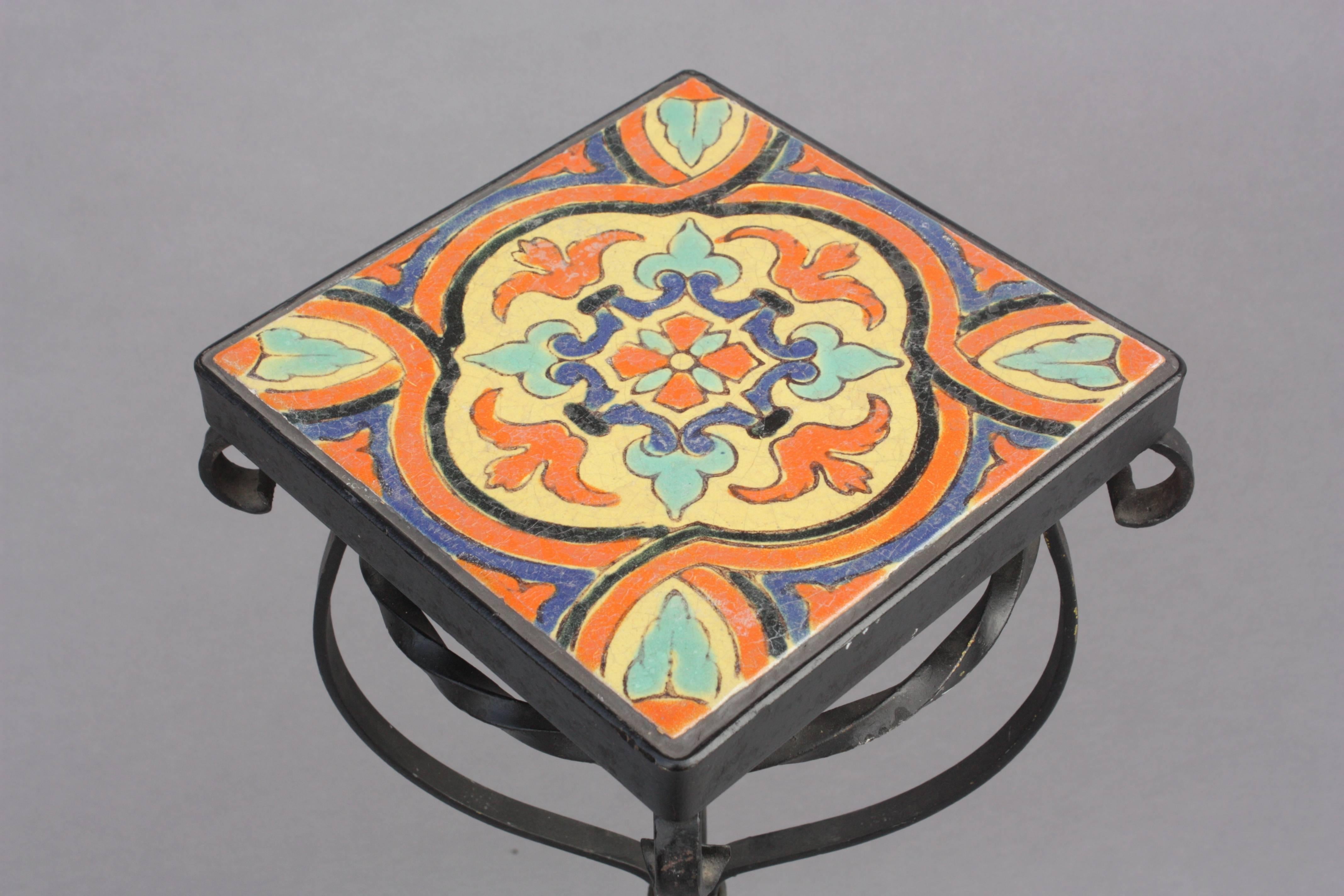 1920s plant stand with nice iron work and beautiful piece of California tile.